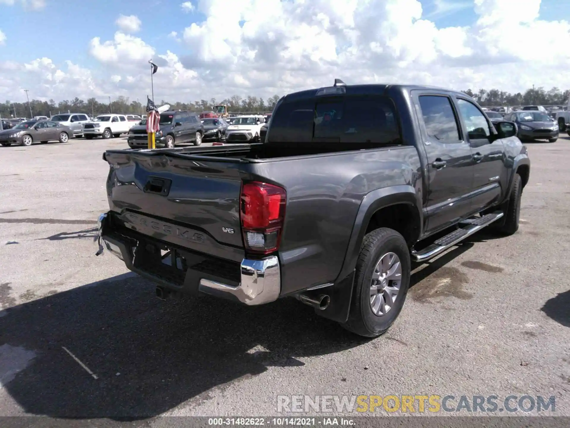 4 Photograph of a damaged car 3TMAZ5CN6KM097154 TOYOTA TACOMA 2WD 2019