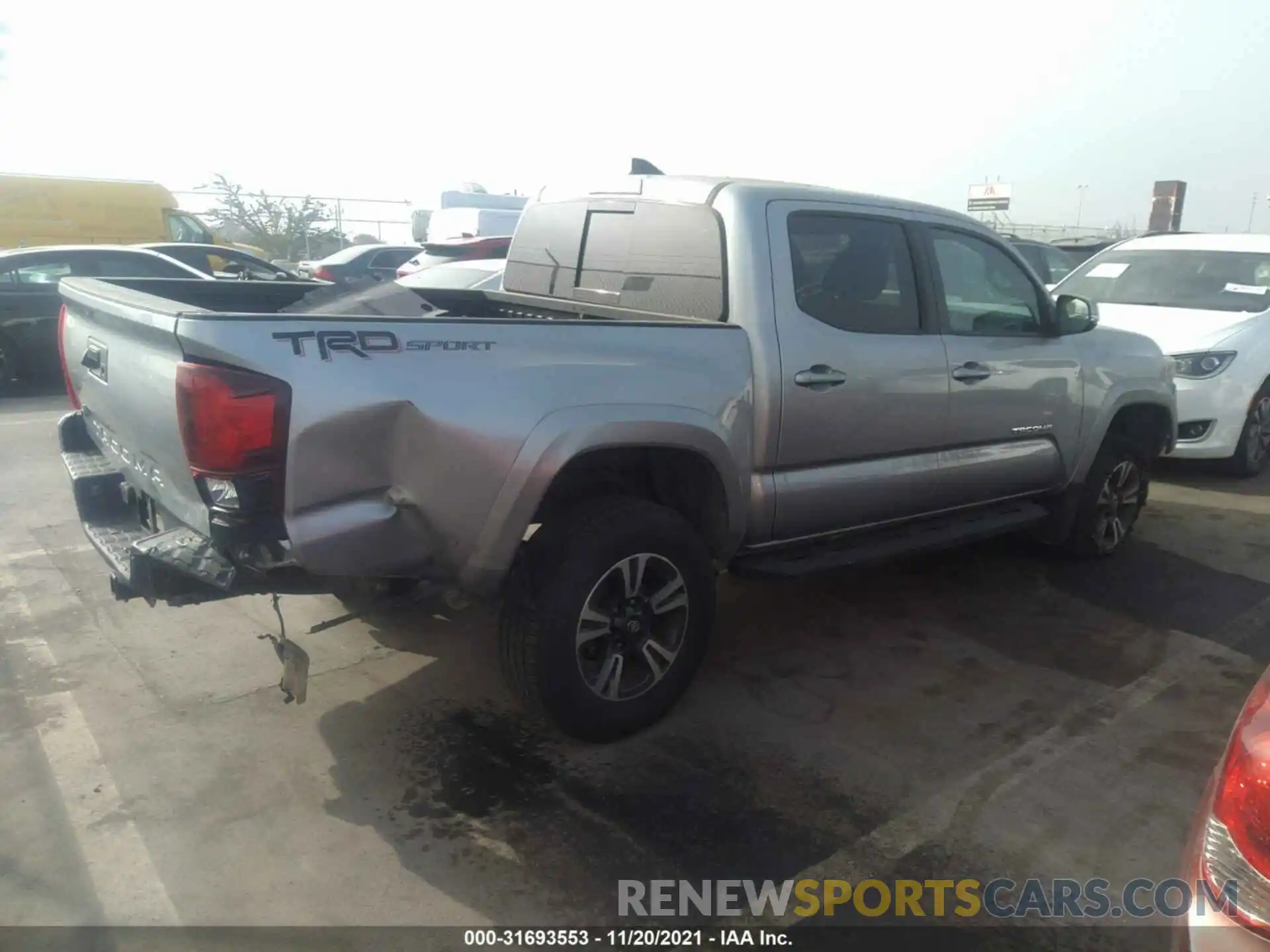 4 Photograph of a damaged car 3TMAZ5CN6KM098126 TOYOTA TACOMA 2WD 2019