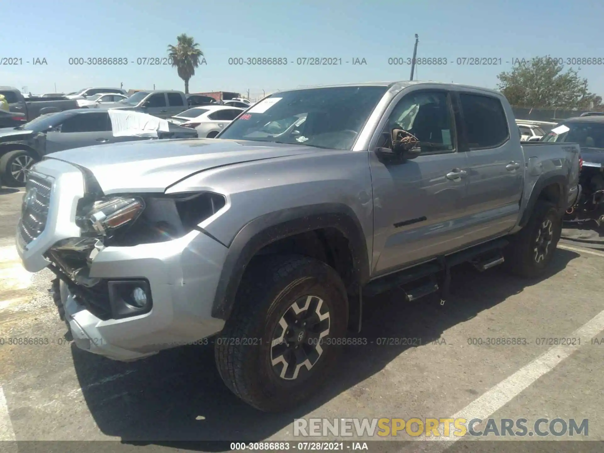 2 Photograph of a damaged car 3TMAZ5CN7KM091282 TOYOTA TACOMA 2WD 2019