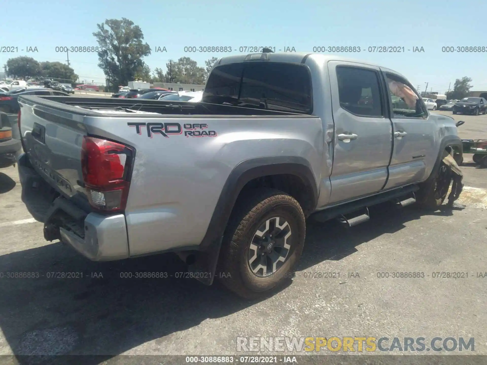 4 Photograph of a damaged car 3TMAZ5CN7KM091282 TOYOTA TACOMA 2WD 2019