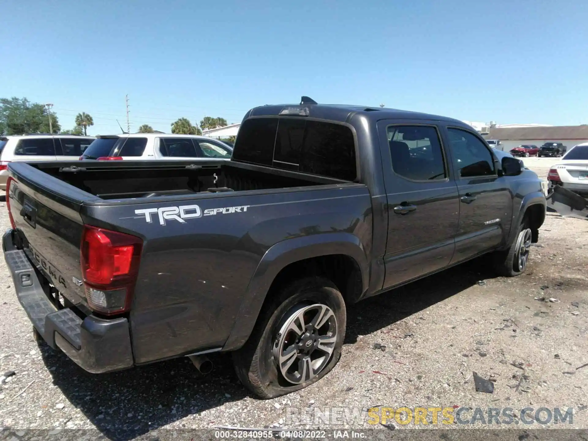 4 Photograph of a damaged car 3TMAZ5CN7KM096241 TOYOTA TACOMA 2WD 2019