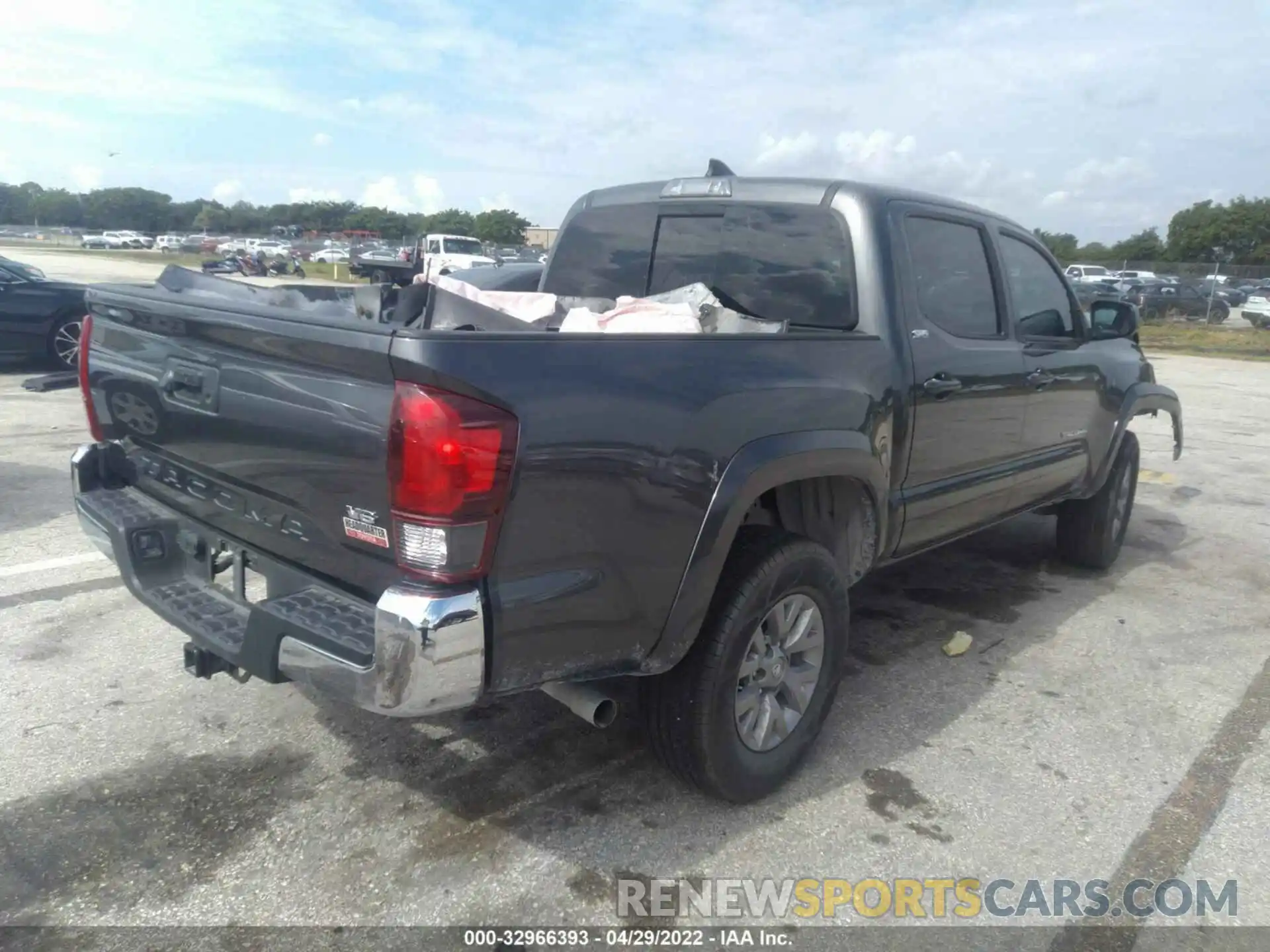 4 Photograph of a damaged car 3TMAZ5CN7KM101518 TOYOTA TACOMA 2WD 2019