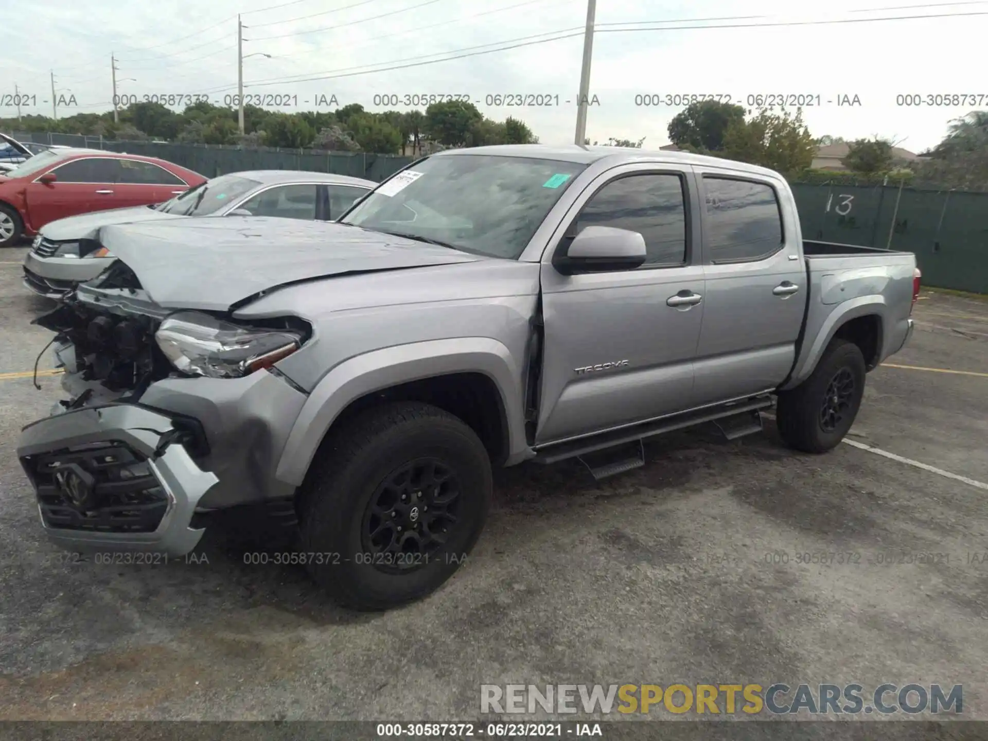 2 Photograph of a damaged car 3TMAZ5CN7KM102393 TOYOTA TACOMA 2WD 2019