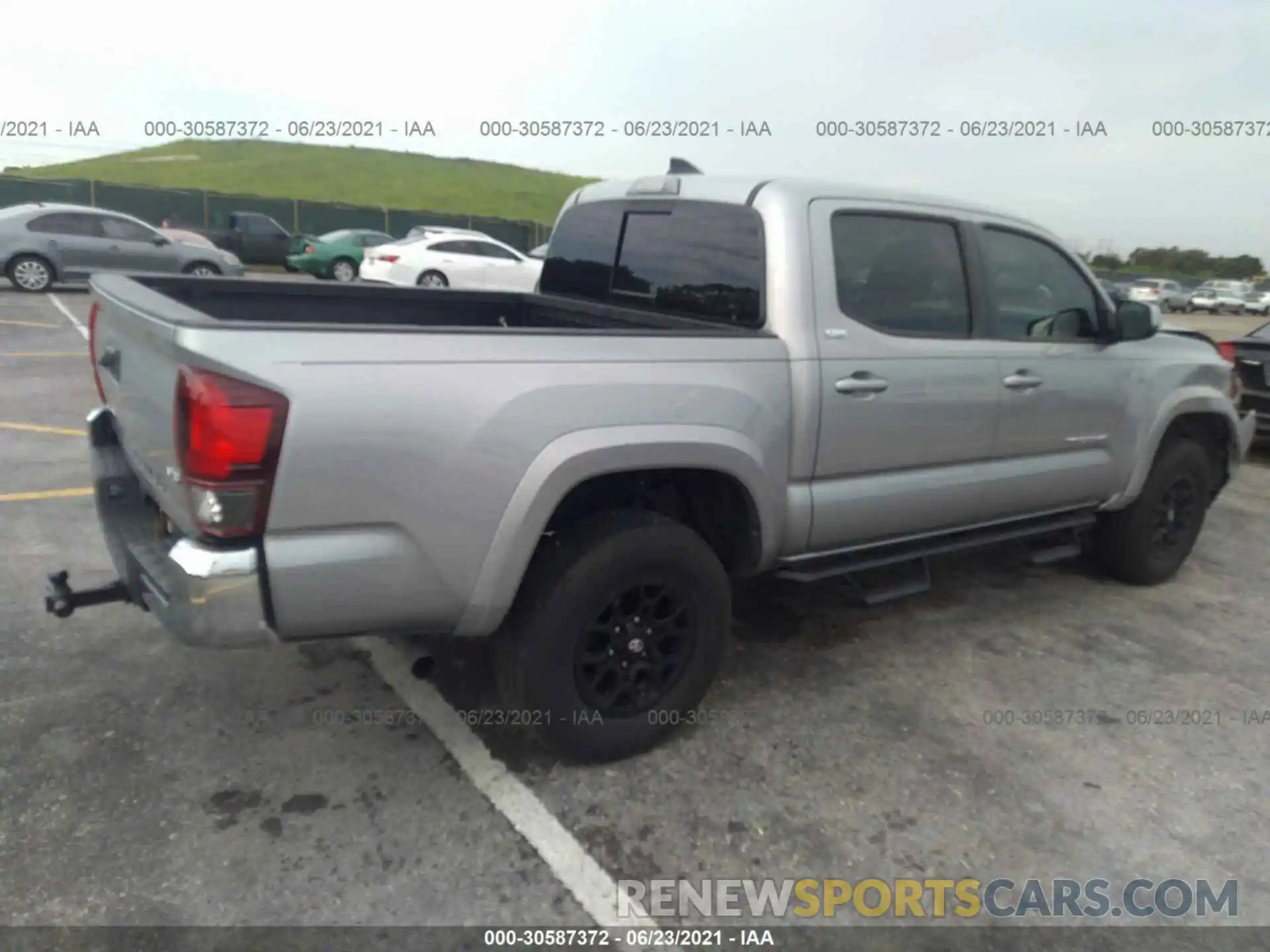 4 Photograph of a damaged car 3TMAZ5CN7KM102393 TOYOTA TACOMA 2WD 2019