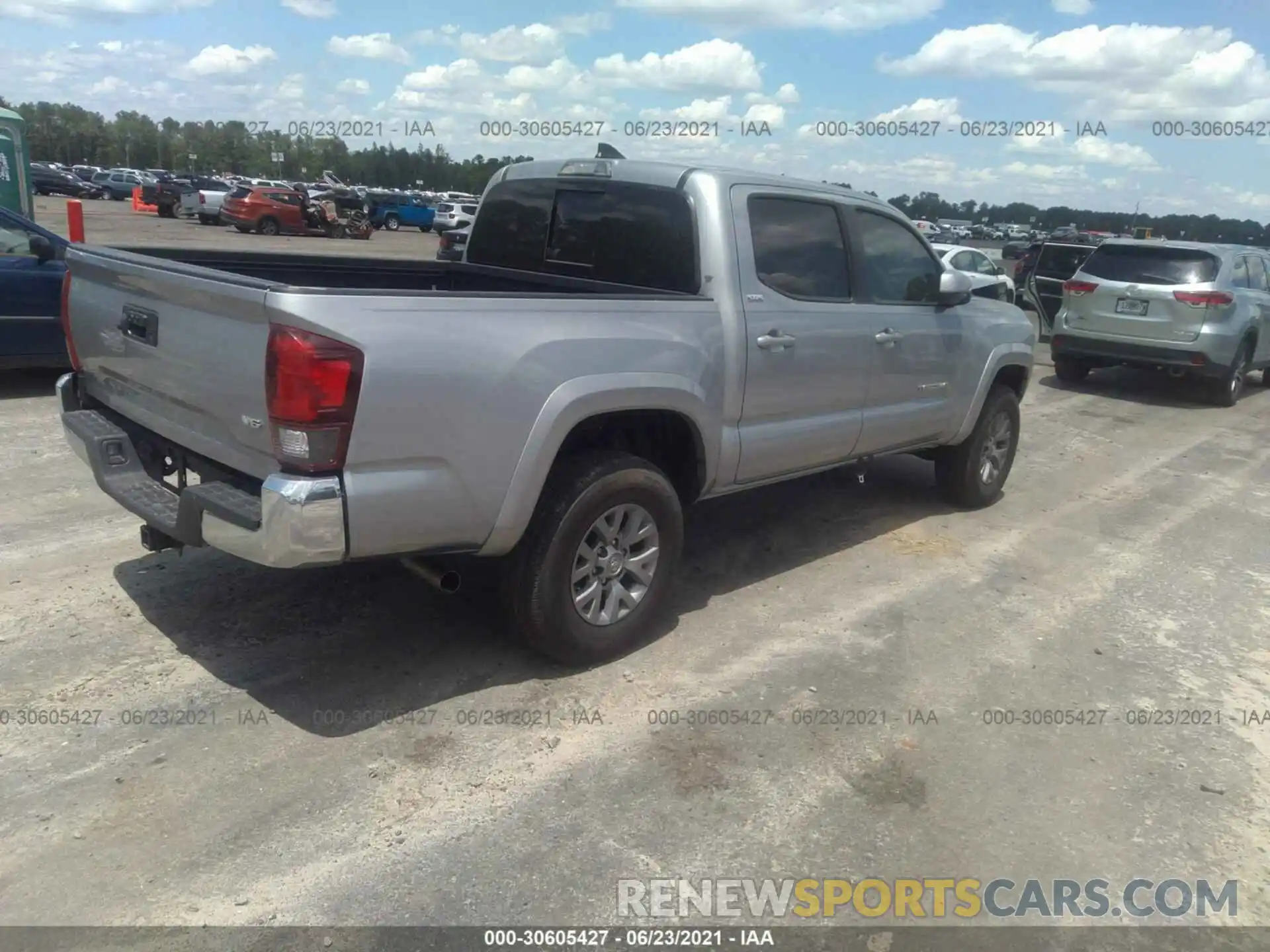 4 Photograph of a damaged car 3TMAZ5CN7KM107528 TOYOTA TACOMA 2WD 2019