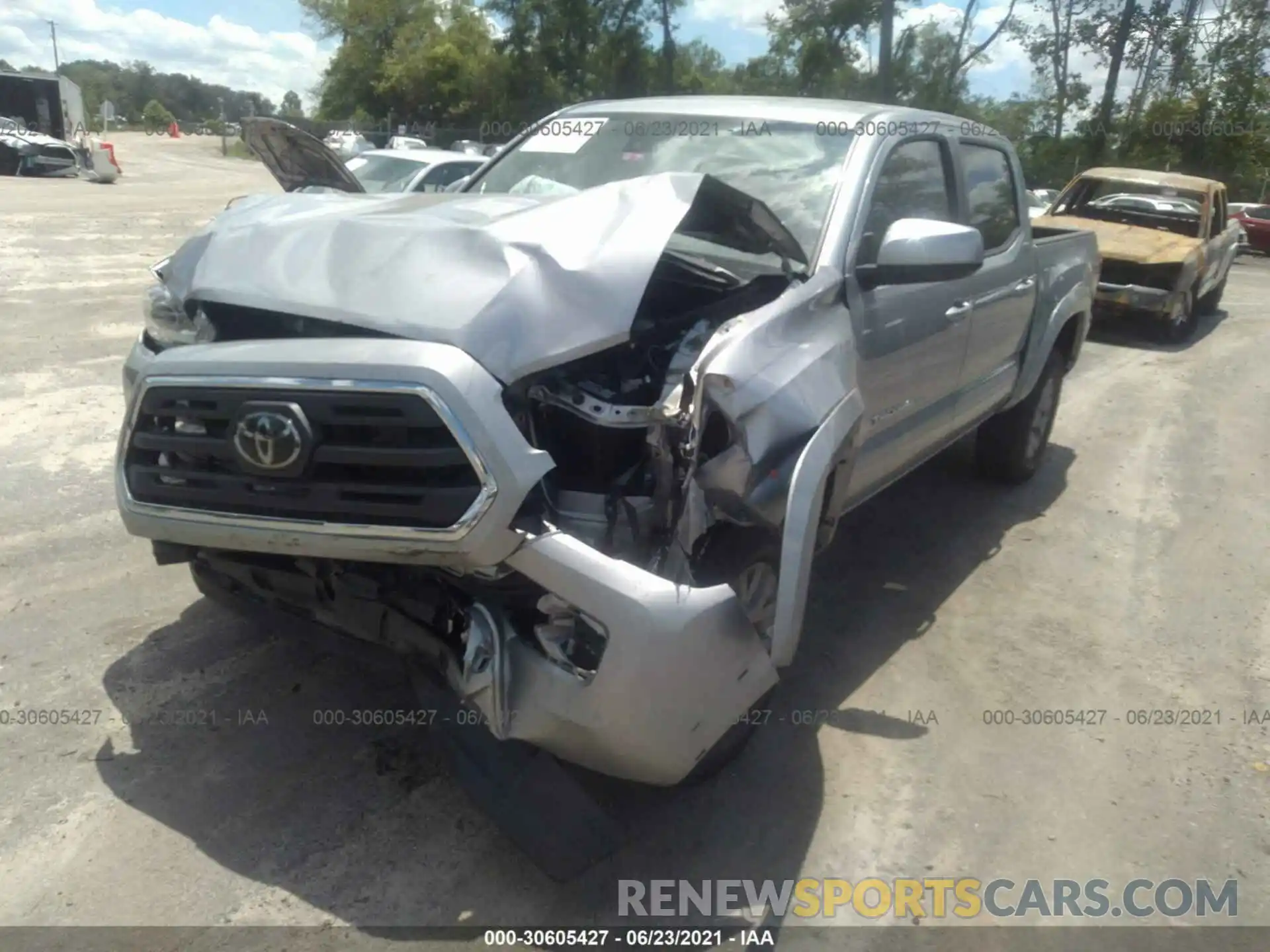 6 Photograph of a damaged car 3TMAZ5CN7KM107528 TOYOTA TACOMA 2WD 2019