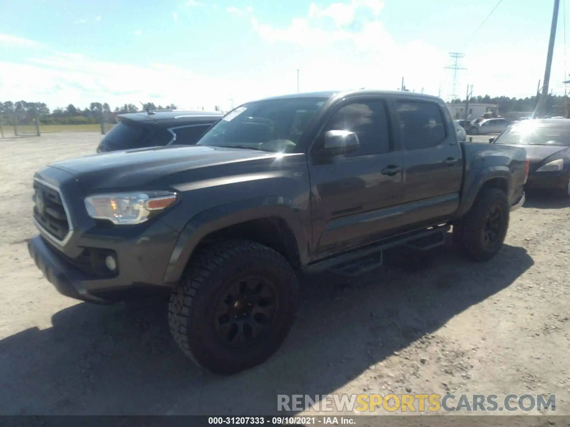 2 Photograph of a damaged car 3TMAZ5CN7KM111269 TOYOTA TACOMA 2WD 2019