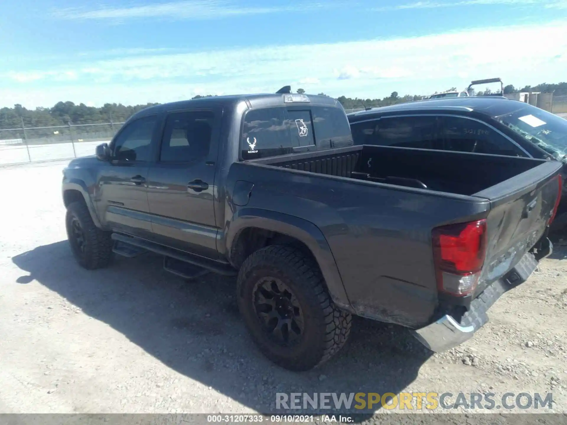 3 Photograph of a damaged car 3TMAZ5CN7KM111269 TOYOTA TACOMA 2WD 2019