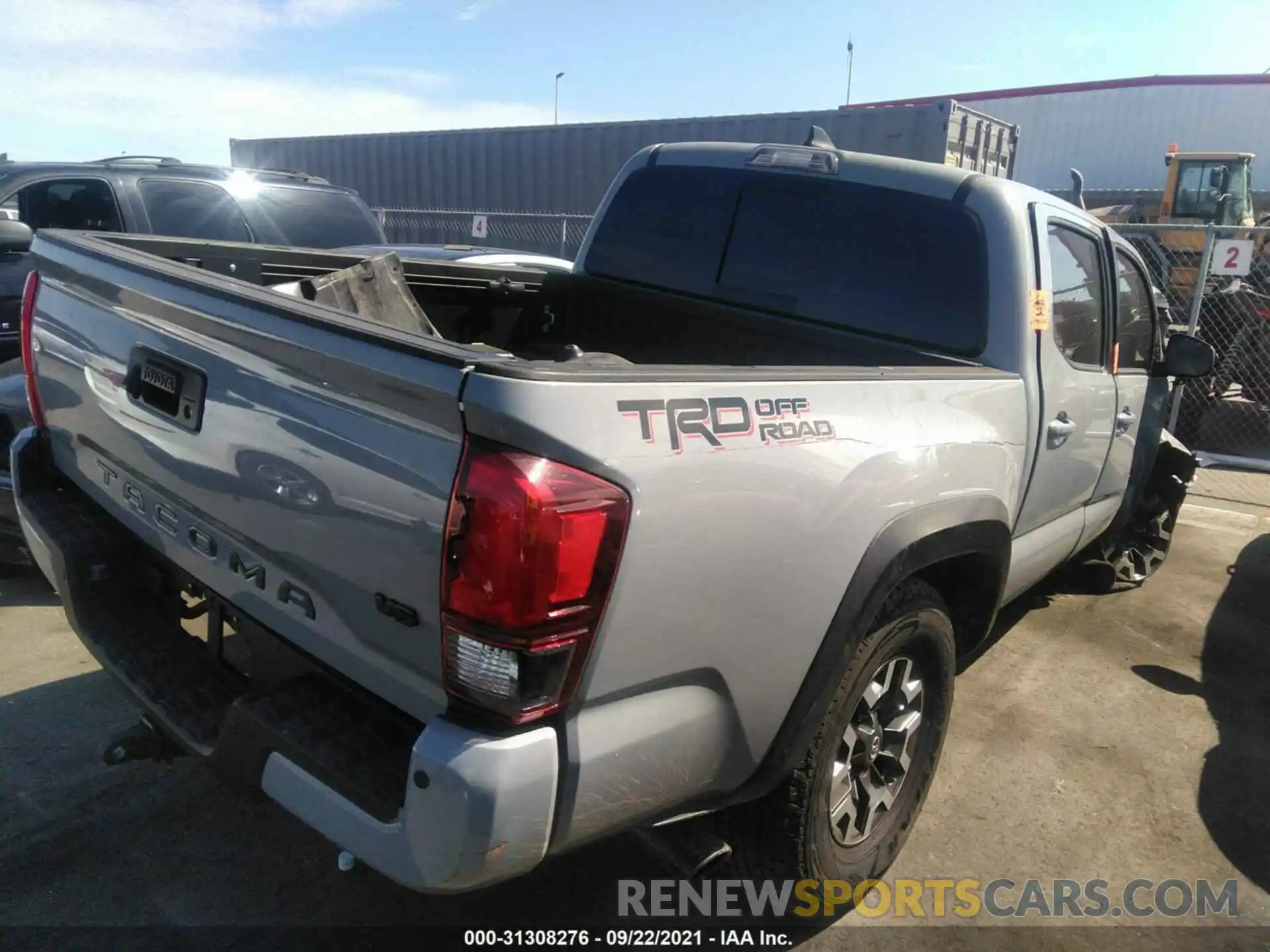 4 Photograph of a damaged car 3TMAZ5CN8KM082378 TOYOTA TACOMA 2WD 2019