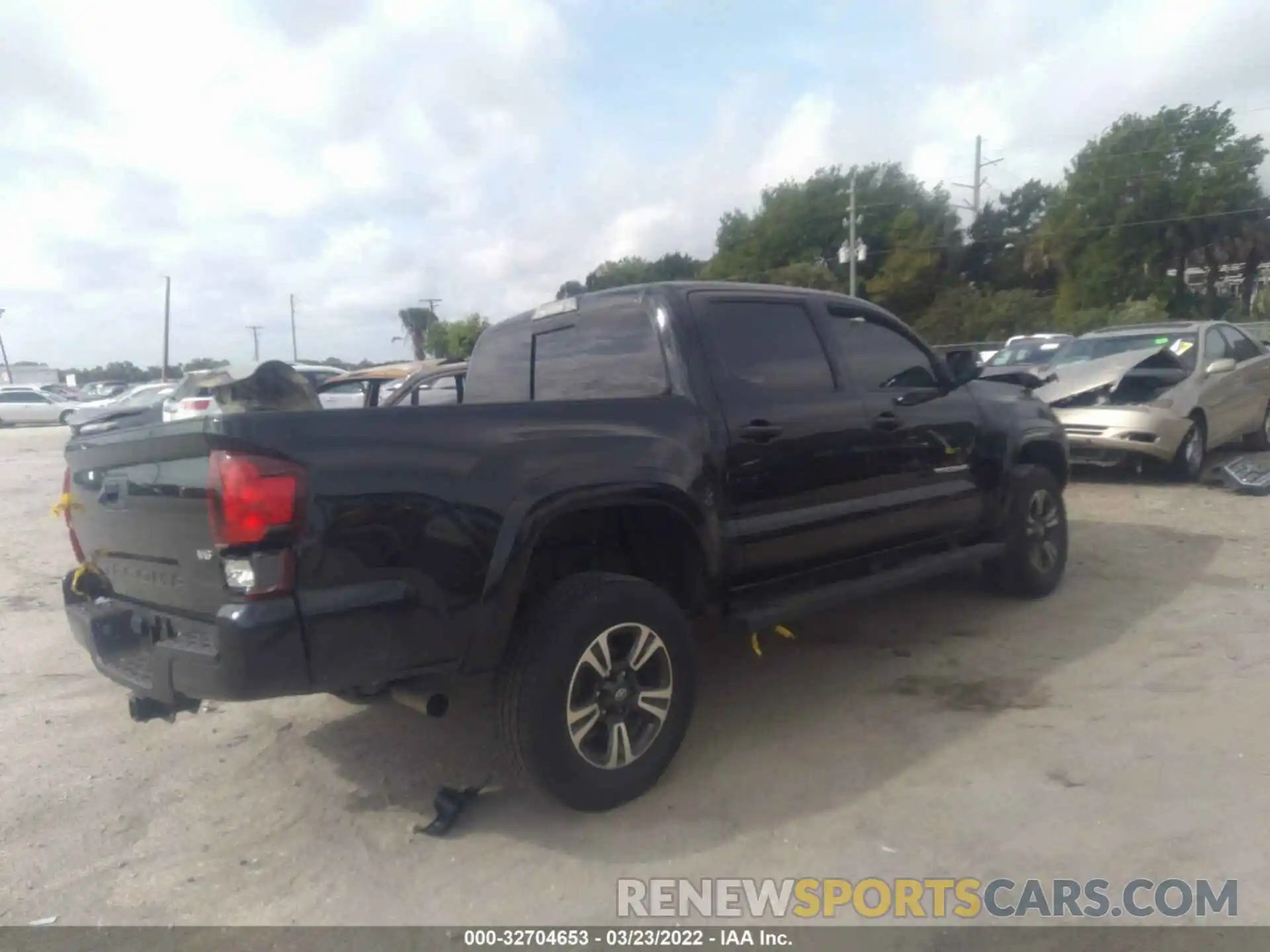 4 Photograph of a damaged car 3TMAZ5CN8KM097303 TOYOTA TACOMA 2WD 2019