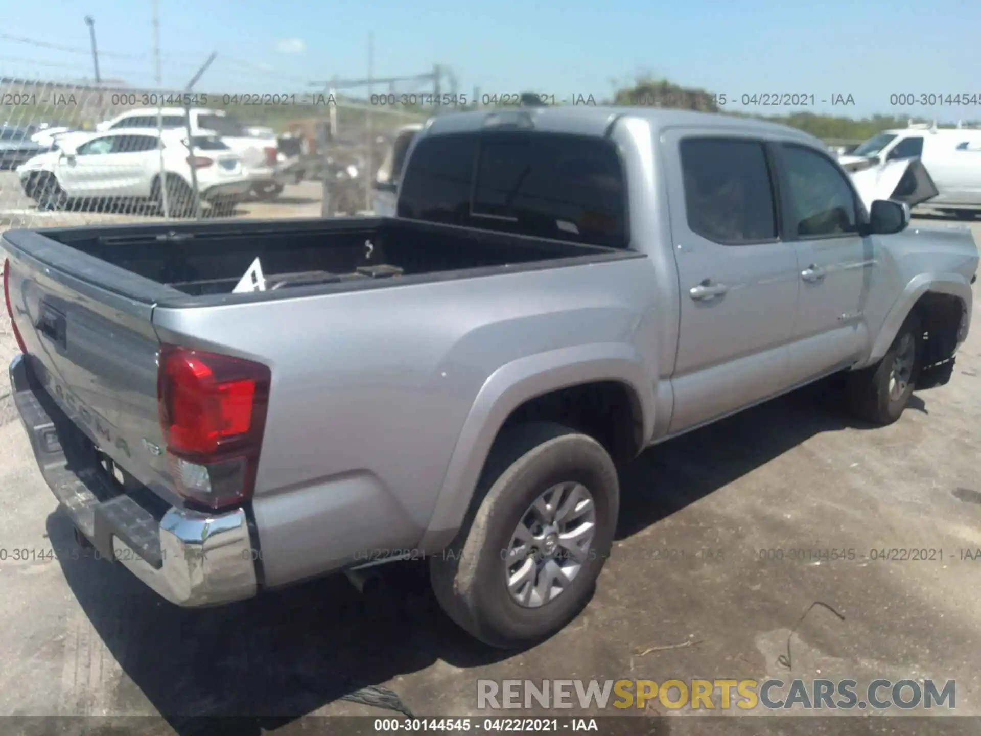 4 Photograph of a damaged car 3TMAZ5CN8KM106775 TOYOTA TACOMA 2WD 2019