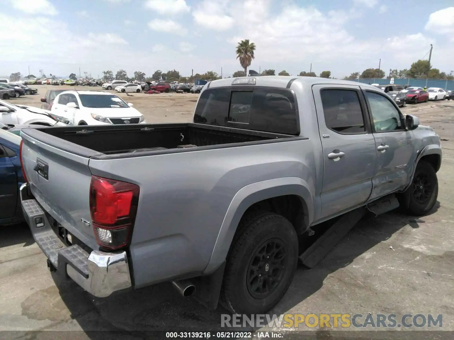 4 Photograph of a damaged car 3TMAZ5CN8KM113368 TOYOTA TACOMA 2WD 2019