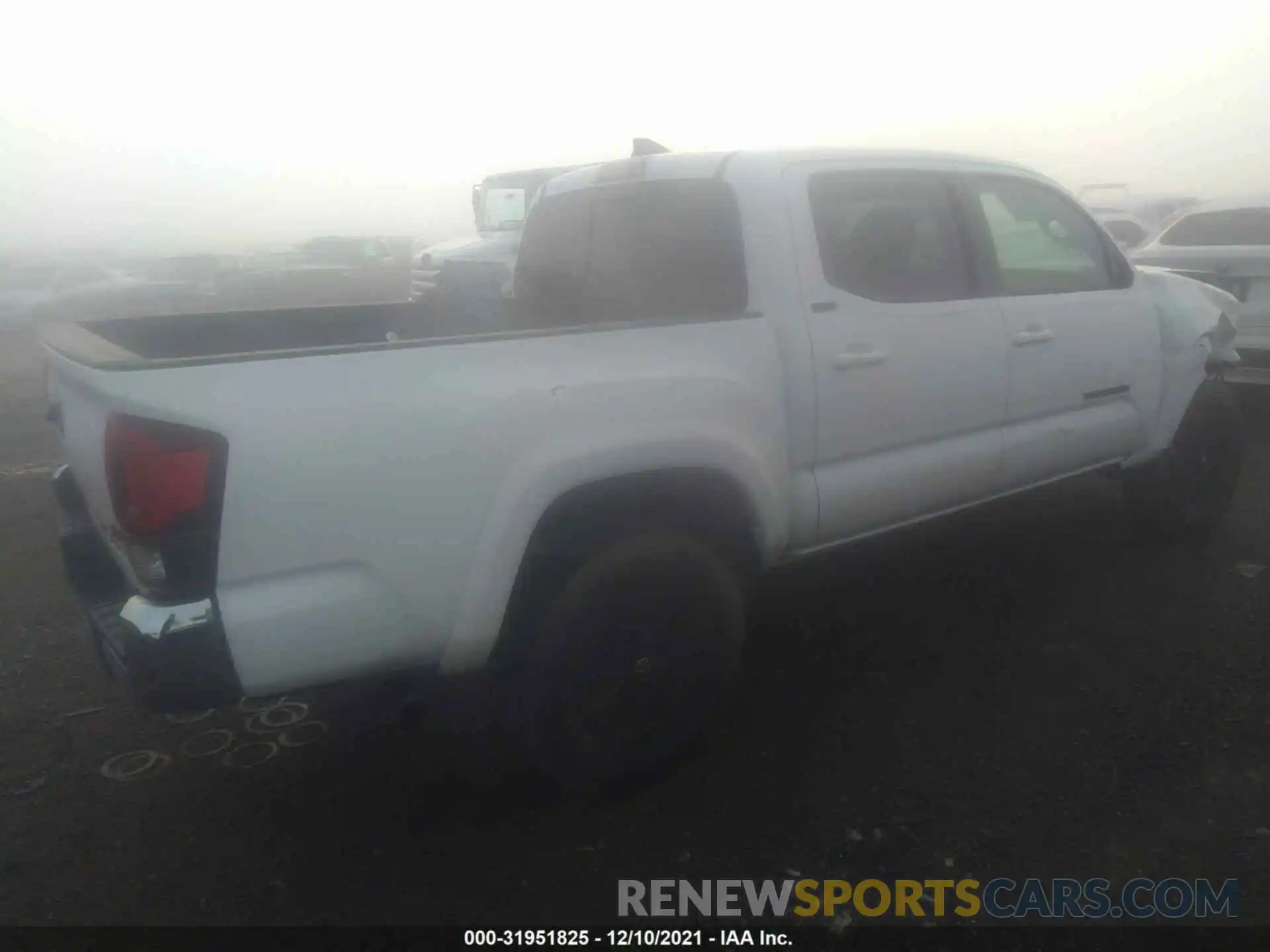 4 Photograph of a damaged car 3TMAZ5CN9KM109748 TOYOTA TACOMA 2WD 2019