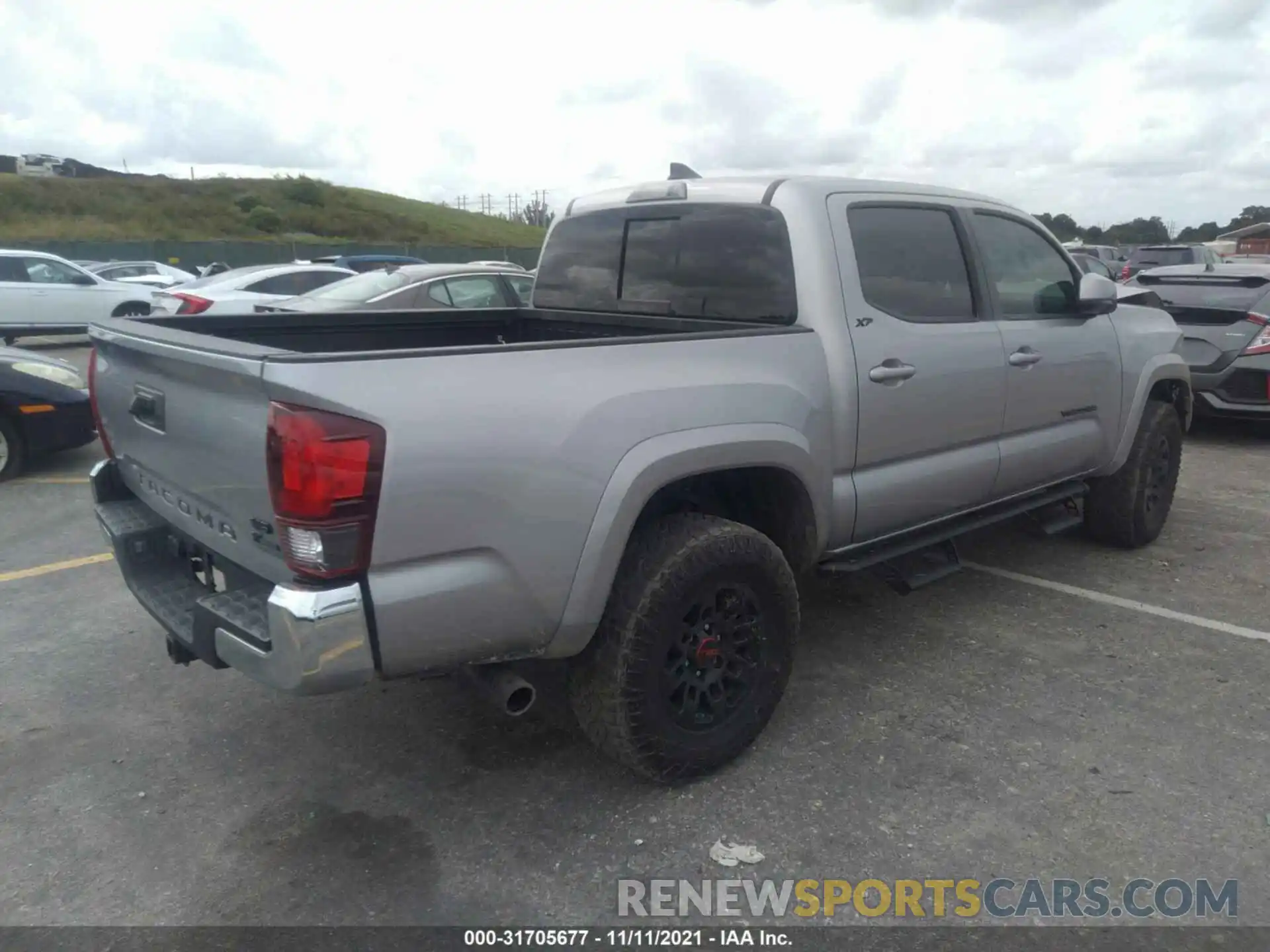 4 Photograph of a damaged car 3TMAZ5CN9KM109894 TOYOTA TACOMA 2WD 2019