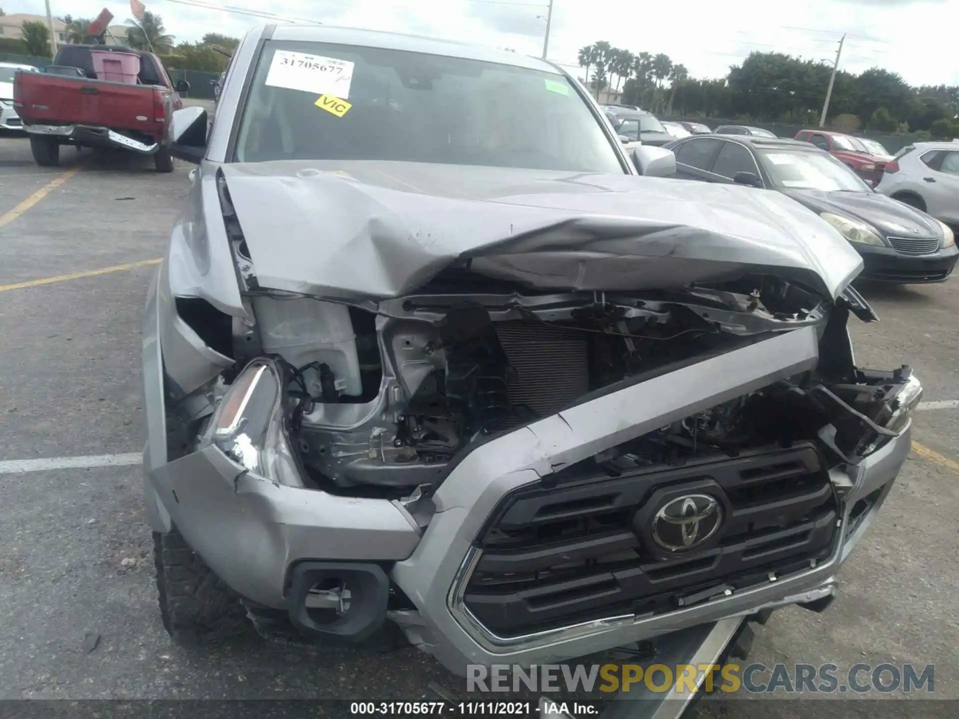 6 Photograph of a damaged car 3TMAZ5CN9KM109894 TOYOTA TACOMA 2WD 2019