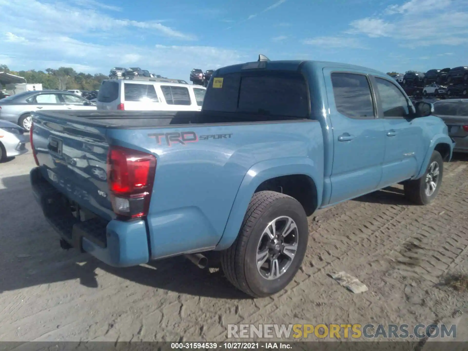 4 Фотография поврежденного автомобиля 3TMAZ5CN9KM110110 TOYOTA TACOMA 2WD 2019