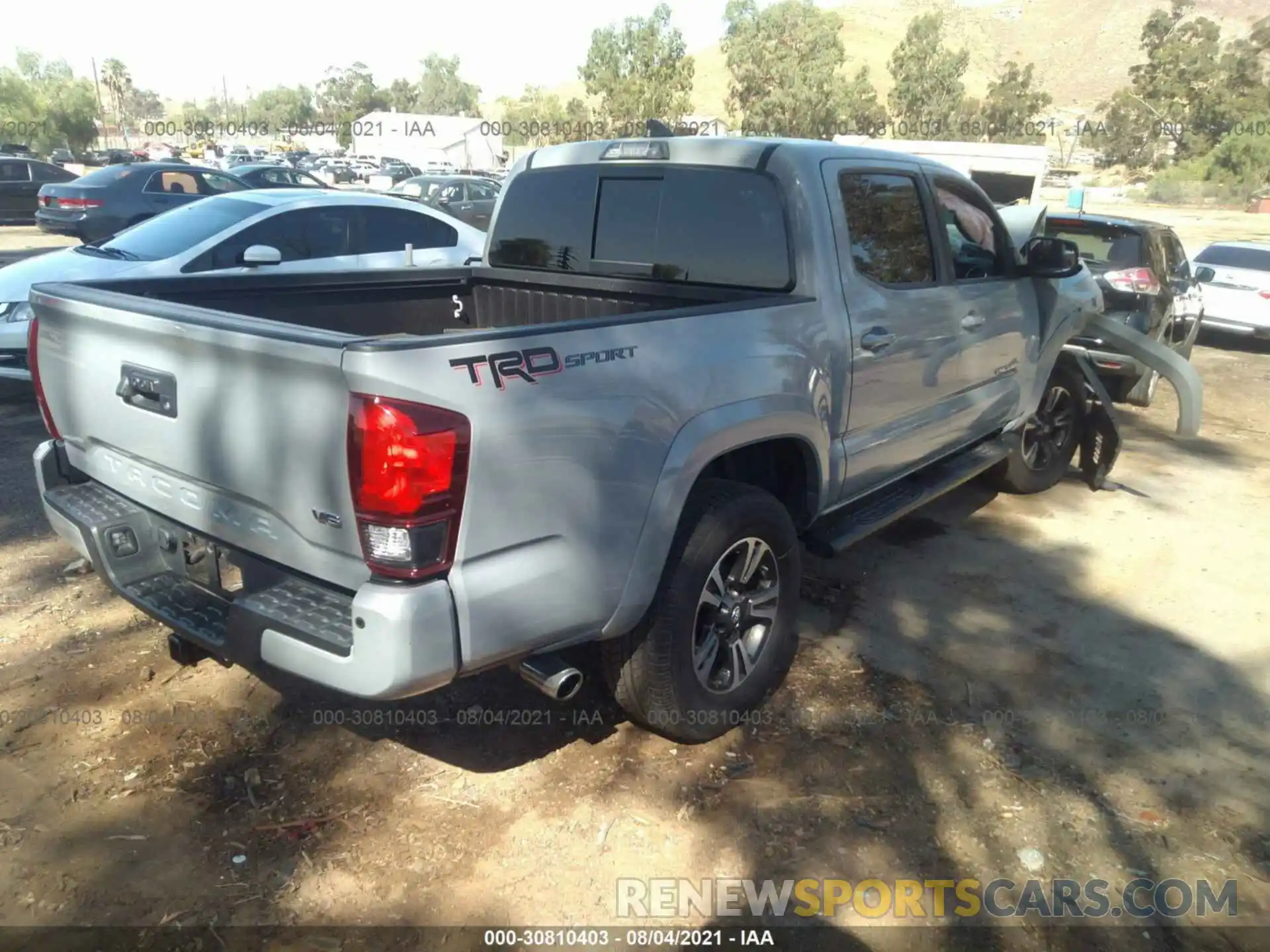 4 Photograph of a damaged car 3TMAZ5CN9KM110317 TOYOTA TACOMA 2WD 2019