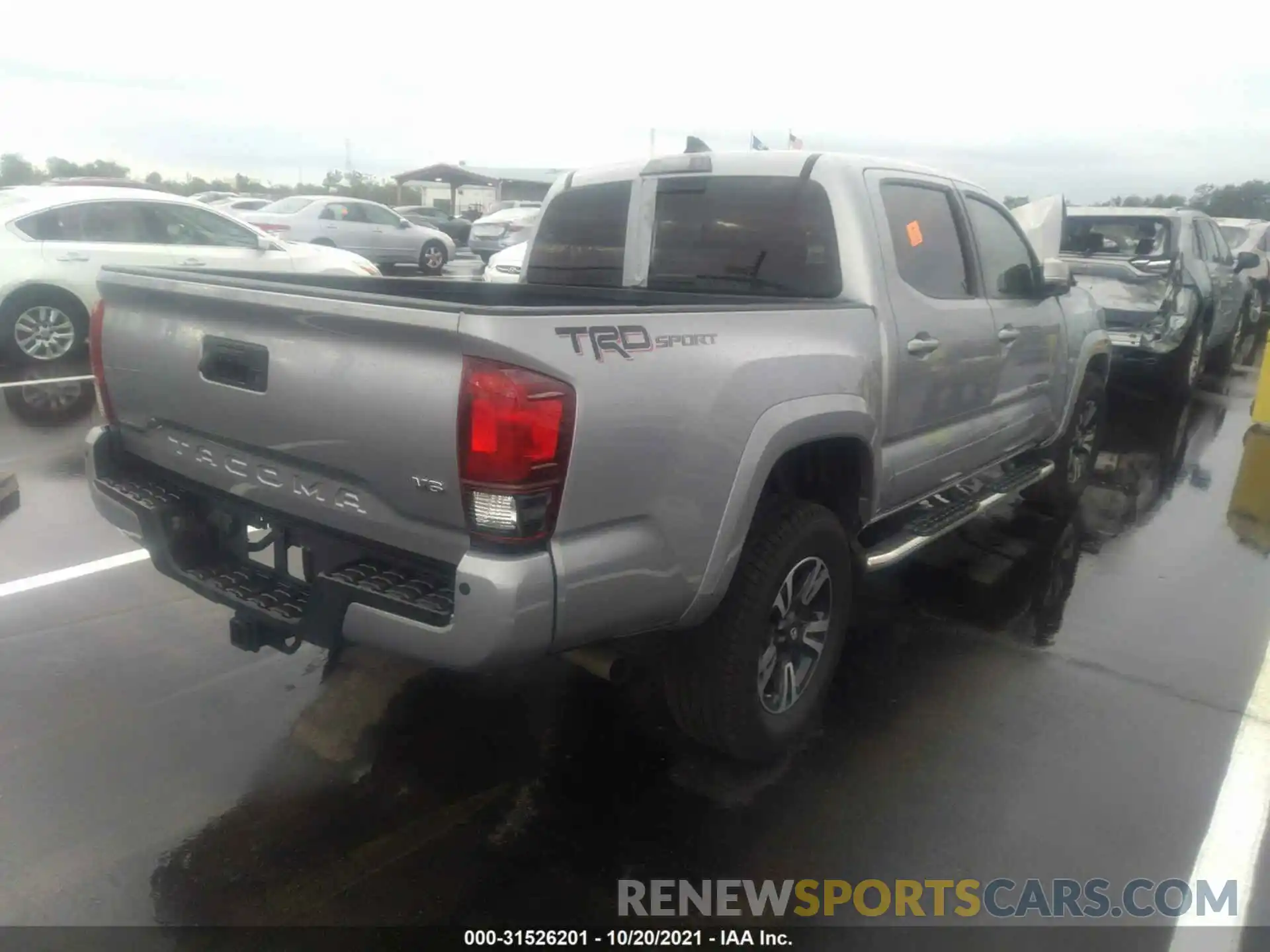 4 Photograph of a damaged car 3TMAZ5CNXKM084634 TOYOTA TACOMA 2WD 2019