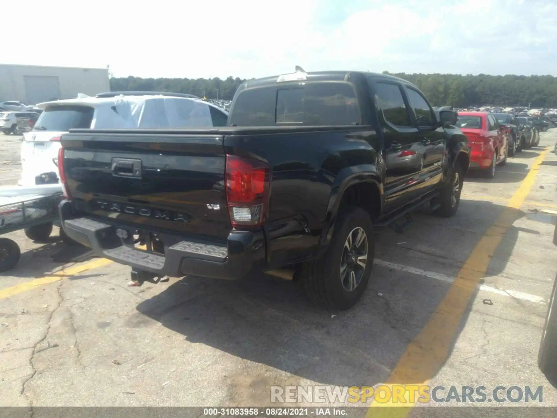 4 Photograph of a damaged car 3TMAZ5CNXKM099893 TOYOTA TACOMA 2WD 2019