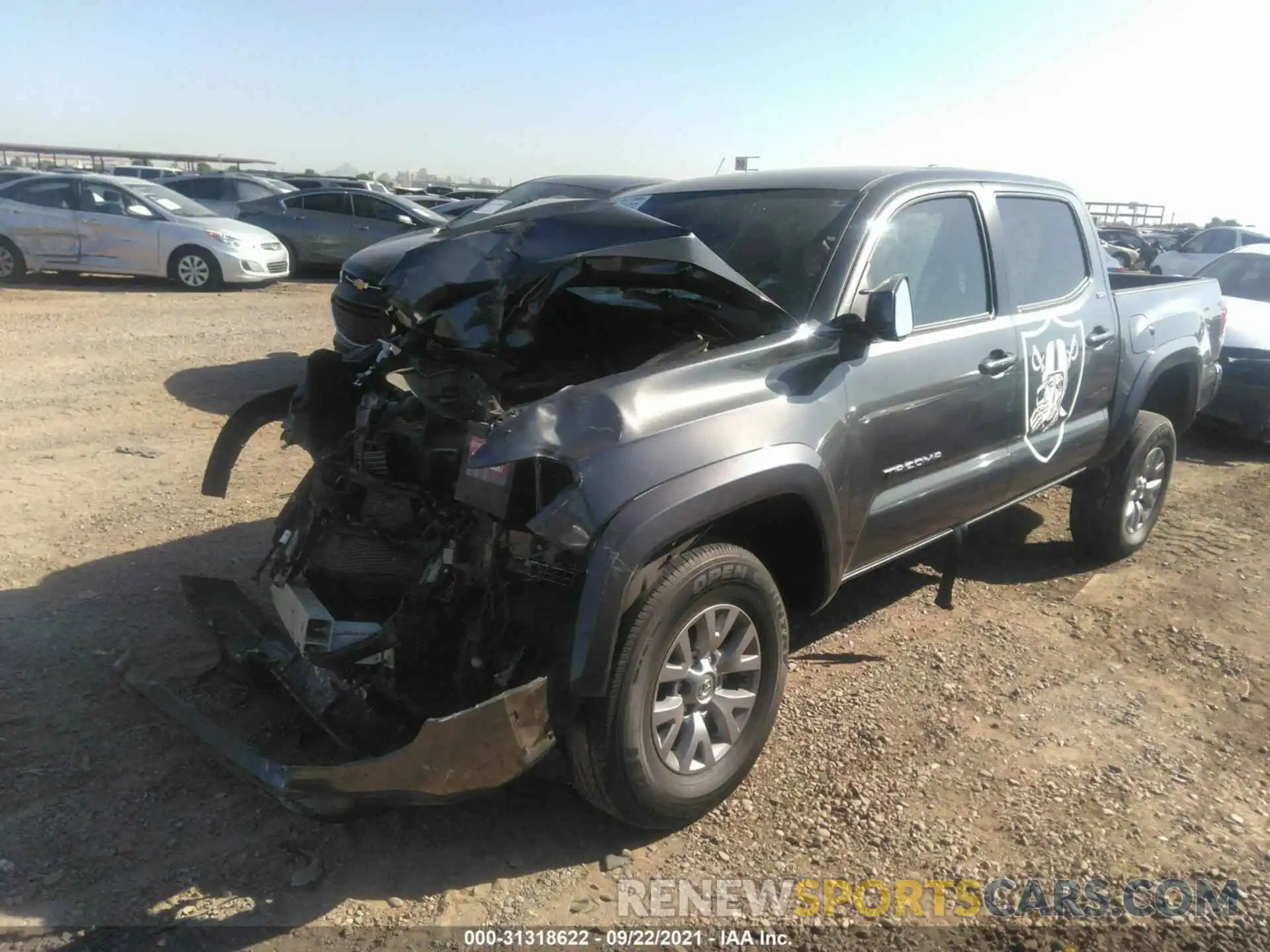 2 Photograph of a damaged car 3TMAZ5CNXKM104218 TOYOTA TACOMA 2WD 2019