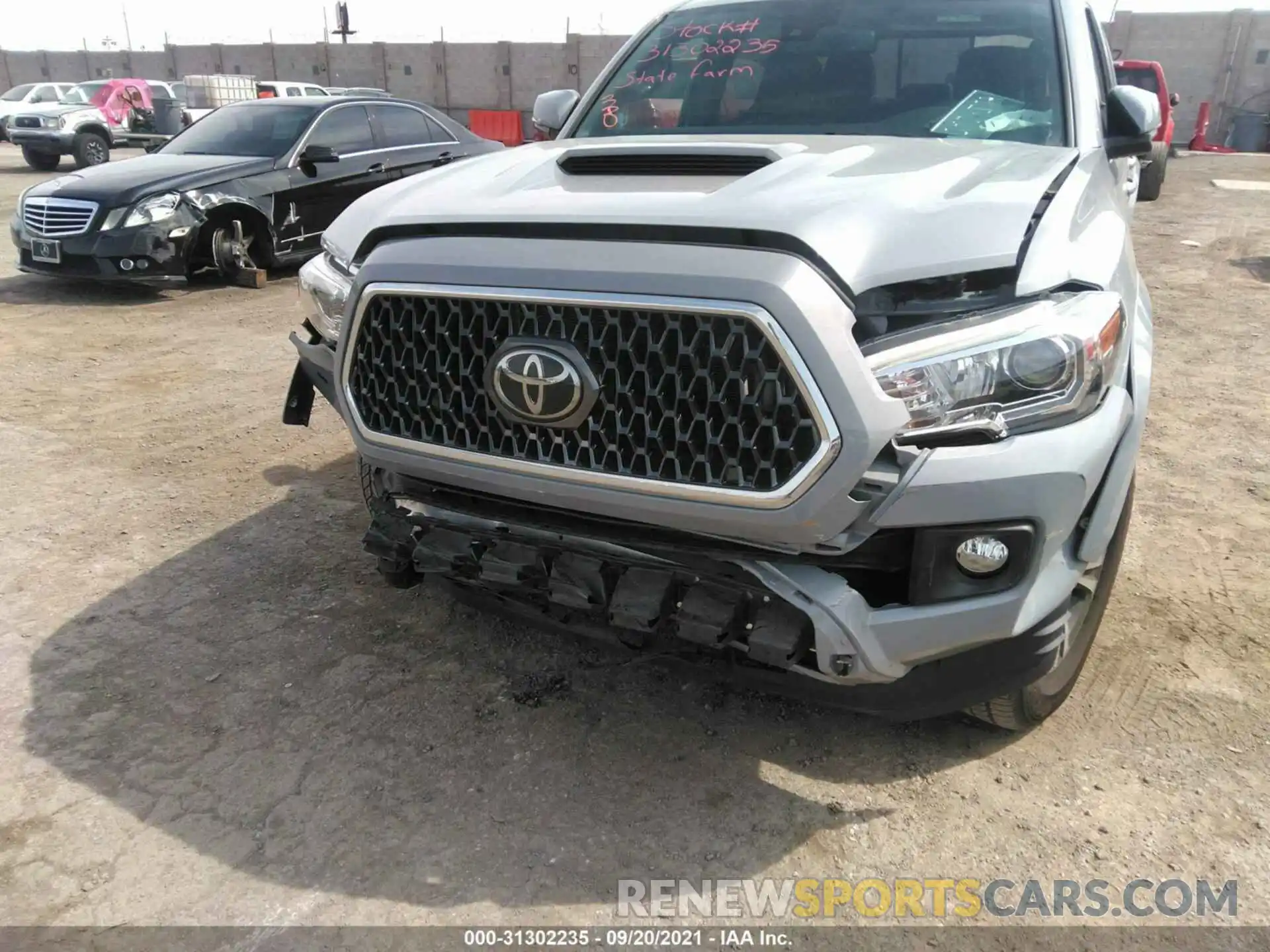 6 Photograph of a damaged car 3TMBZ5DN0KM019116 TOYOTA TACOMA 2WD 2019