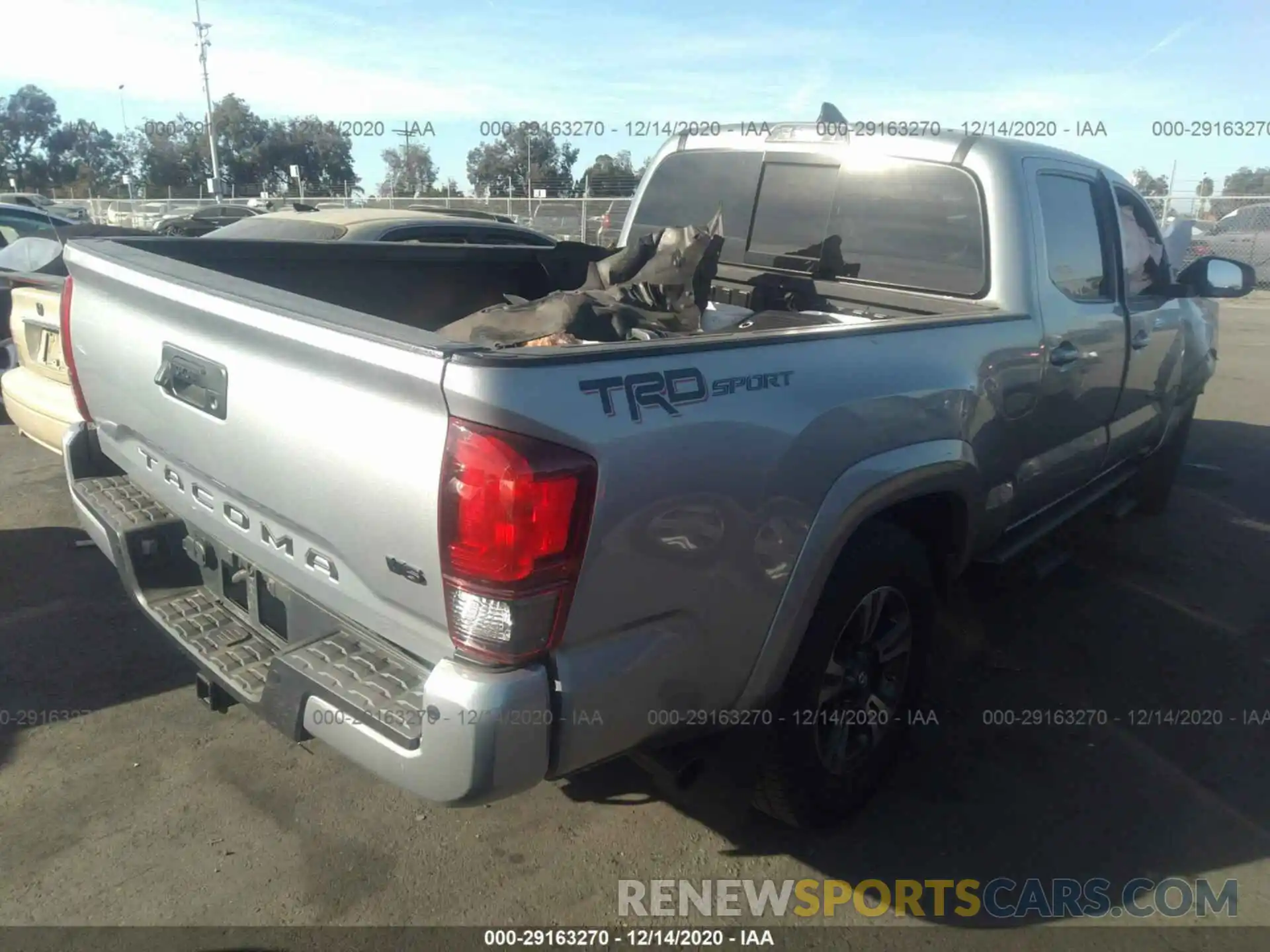 4 Photograph of a damaged car 3TMBZ5DN0KM021450 TOYOTA TACOMA 2WD 2019