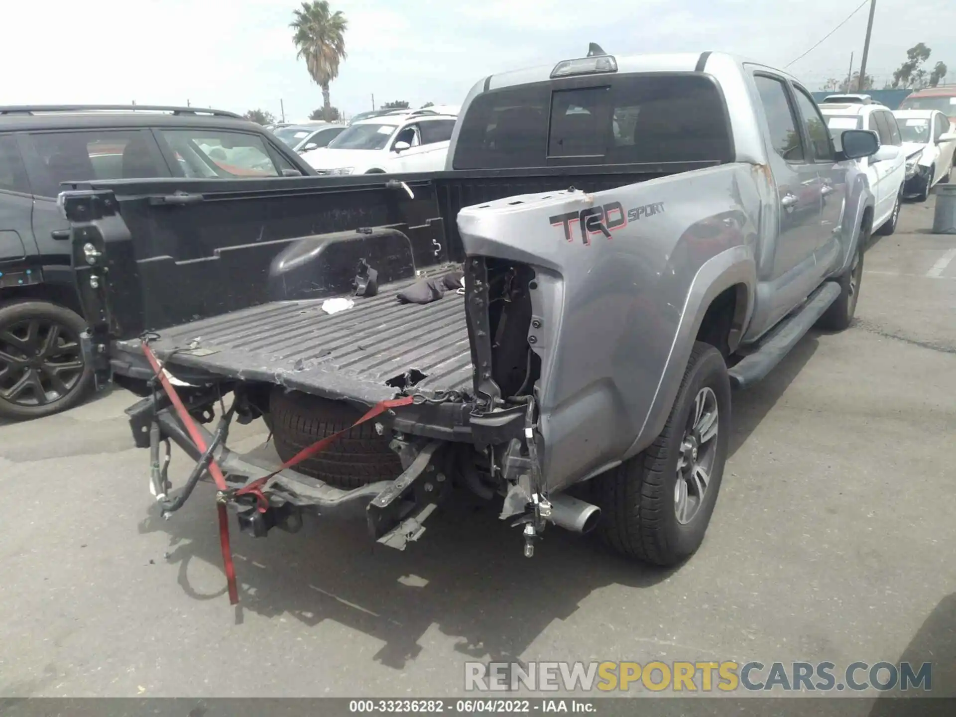 4 Photograph of a damaged car 3TMBZ5DN1KM023157 TOYOTA TACOMA 2WD 2019