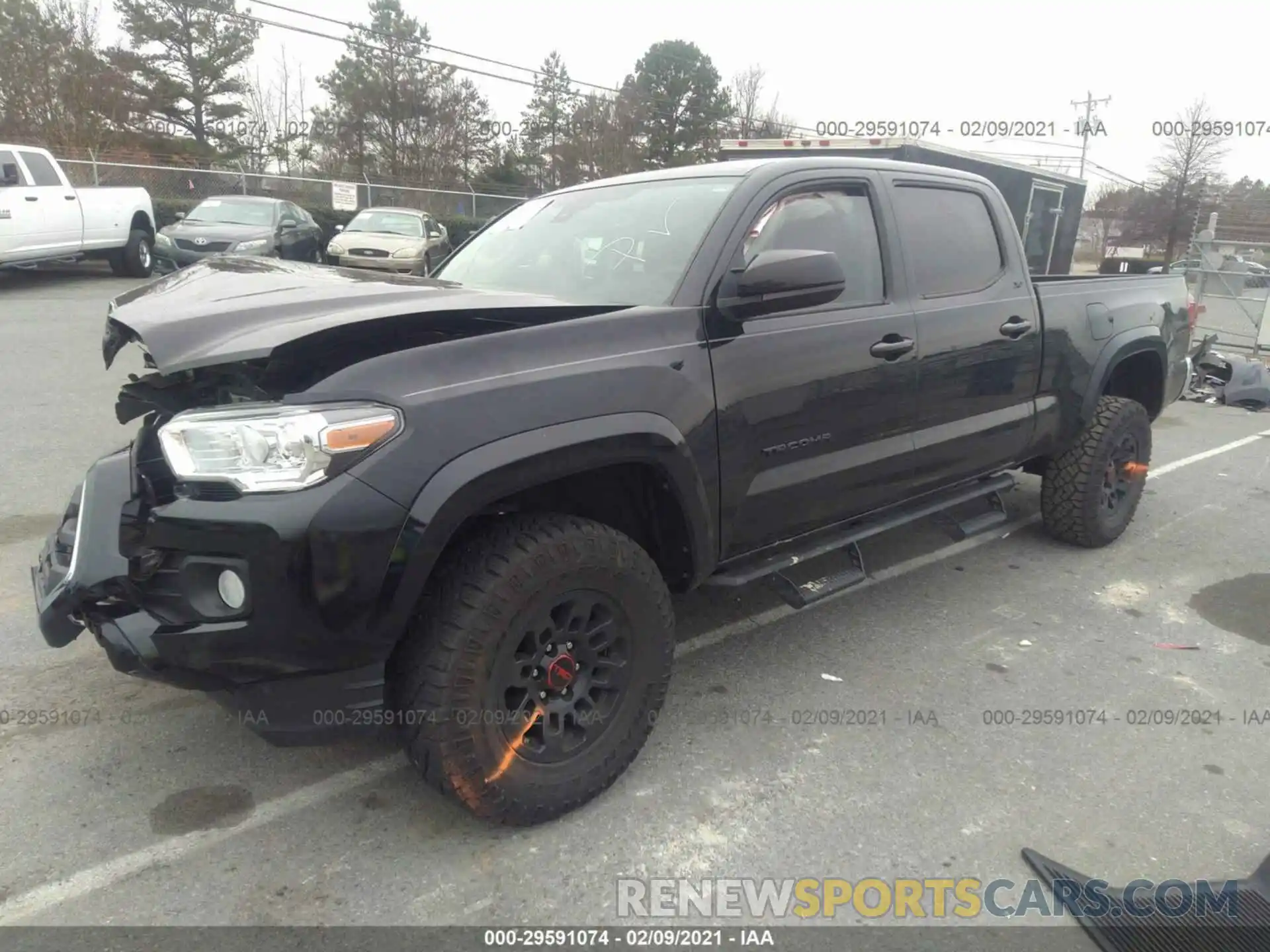 2 Photograph of a damaged car 3TMBZ5DN2KM023166 TOYOTA TACOMA 2WD 2019