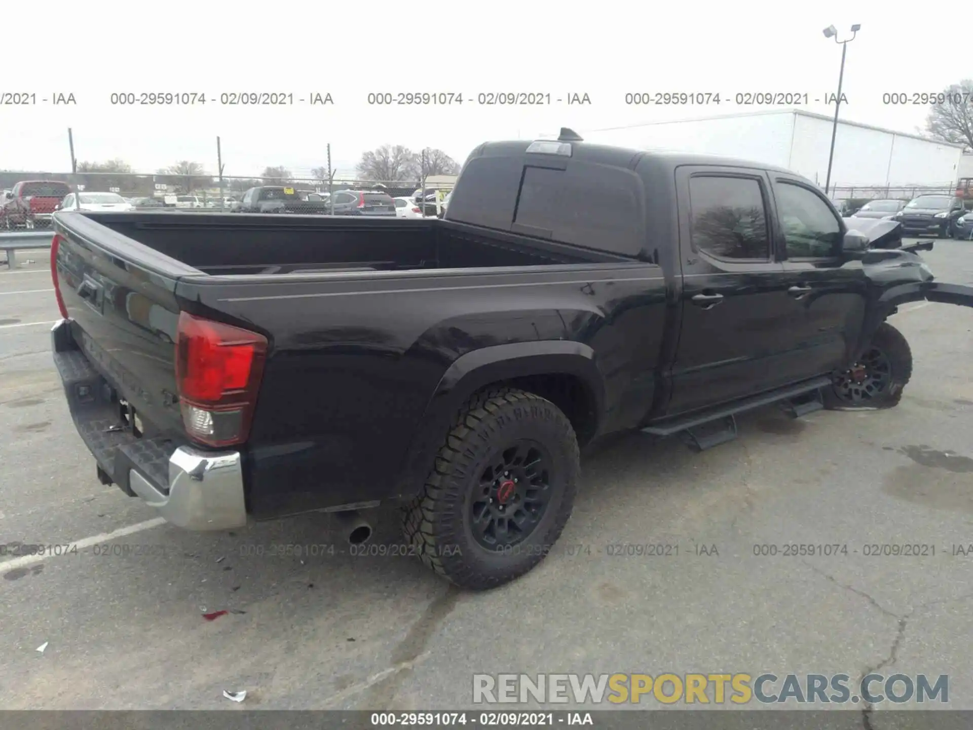 4 Photograph of a damaged car 3TMBZ5DN2KM023166 TOYOTA TACOMA 2WD 2019