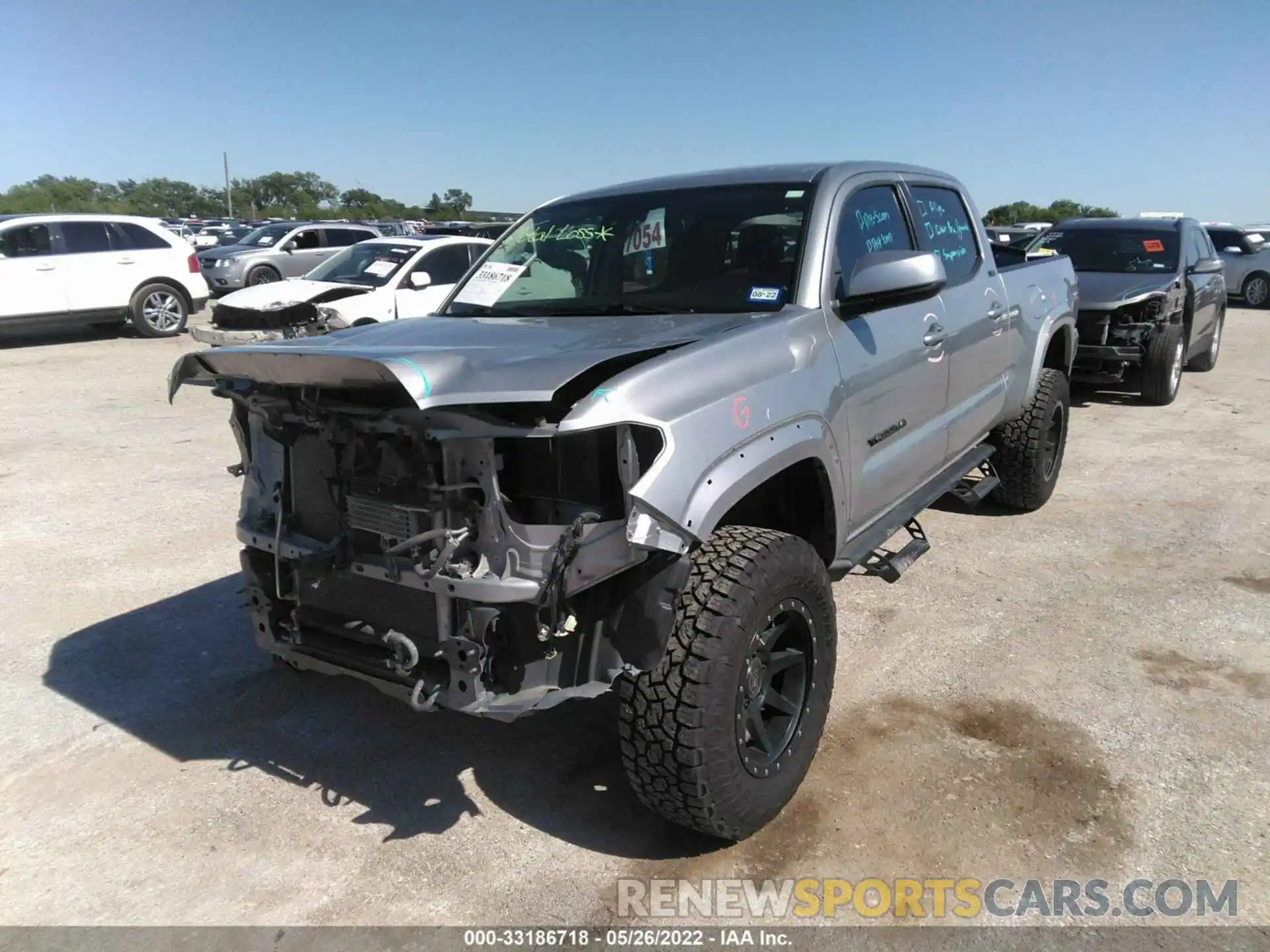 2 Photograph of a damaged car 3TMBZ5DN4KM023024 TOYOTA TACOMA 2WD 2019