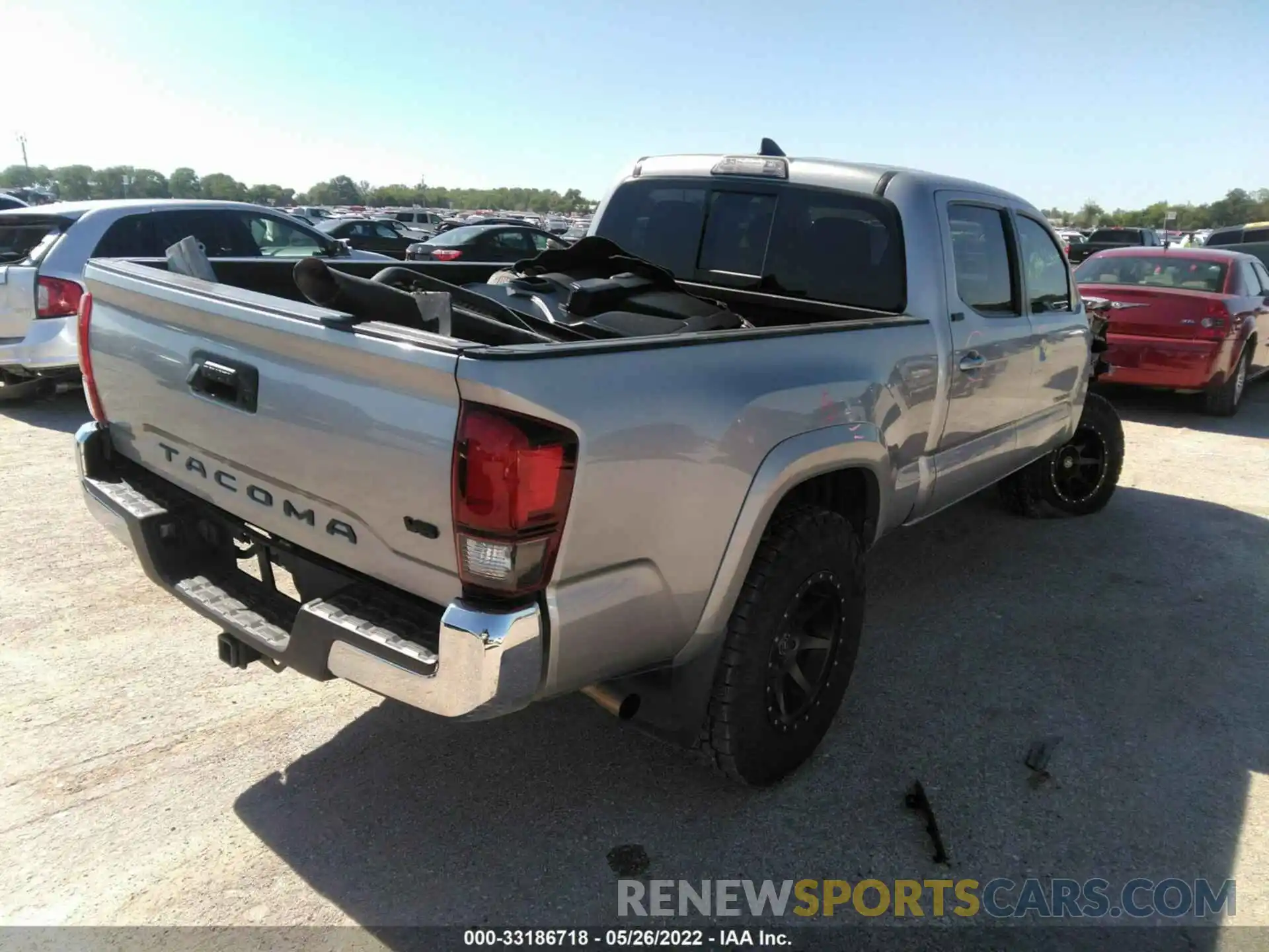 4 Photograph of a damaged car 3TMBZ5DN4KM023024 TOYOTA TACOMA 2WD 2019