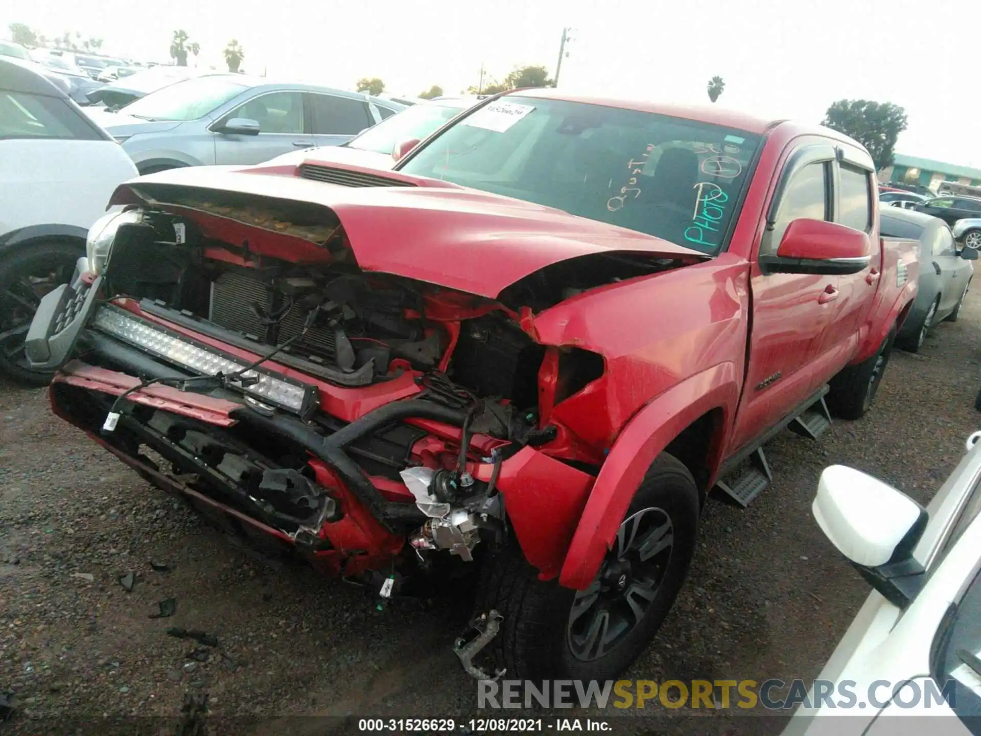 2 Photograph of a damaged car 3TMBZ5DN7KM018240 TOYOTA TACOMA 2WD 2019