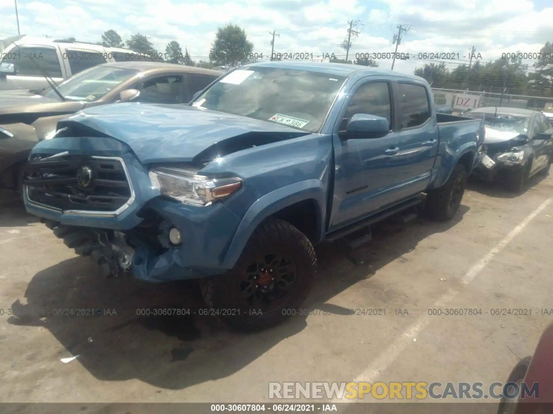 2 Photograph of a damaged car 3TMBZ5DN7KM018609 TOYOTA TACOMA 2WD 2019