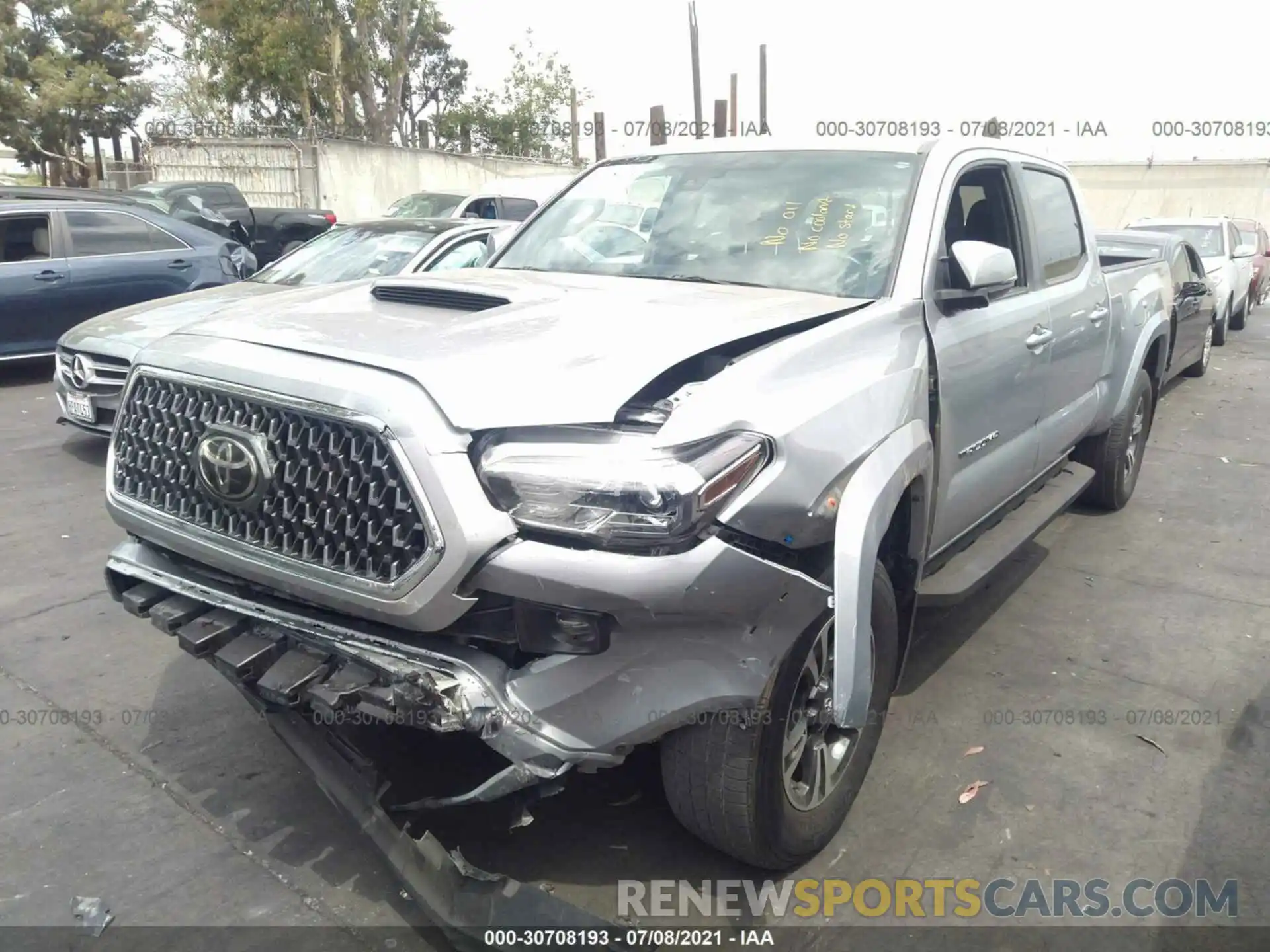 2 Photograph of a damaged car 3TMBZ5DN7KM019887 TOYOTA TACOMA 2WD 2019