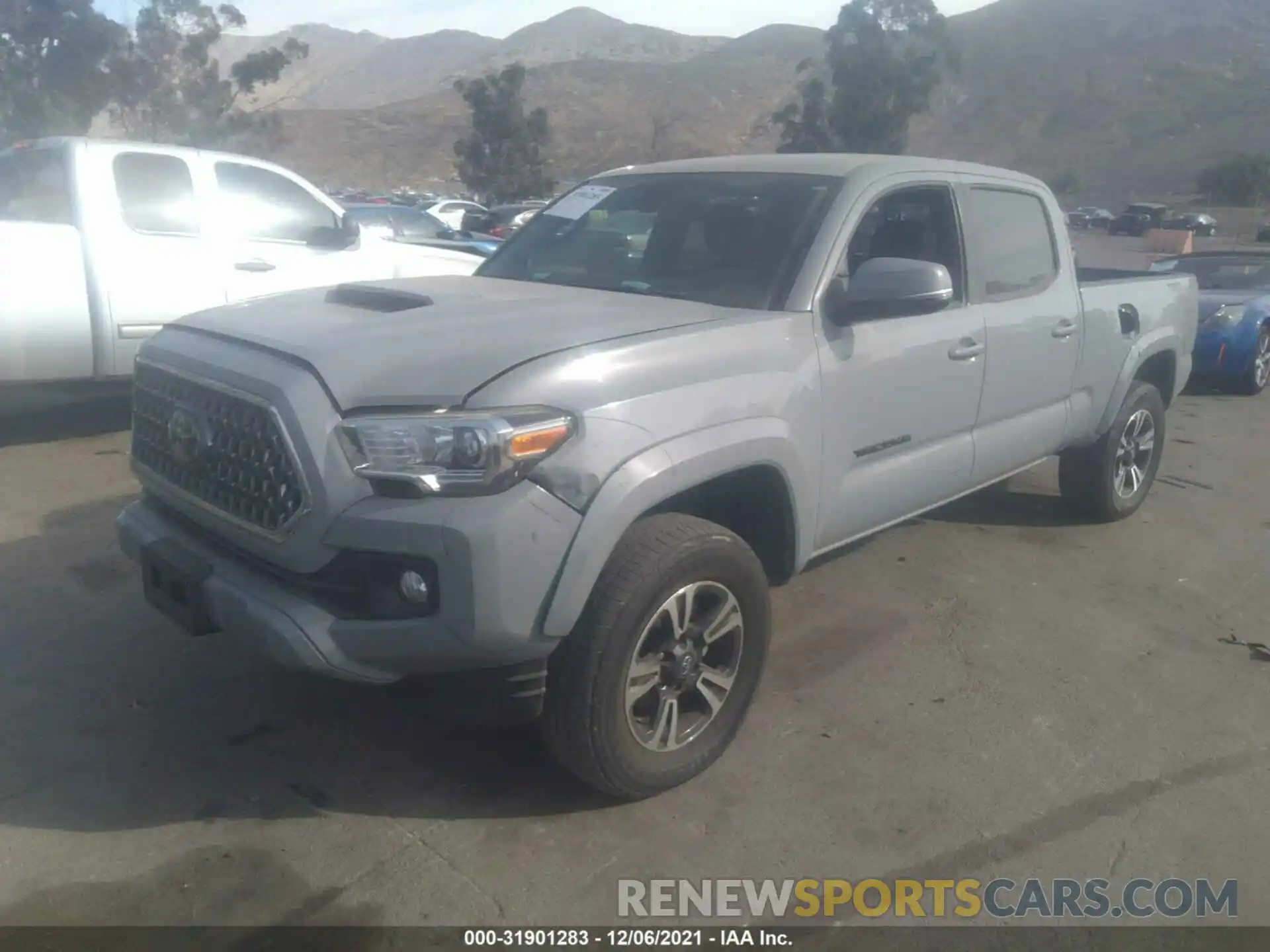 2 Photograph of a damaged car 3TMBZ5DN9KM023259 TOYOTA TACOMA 2WD 2019