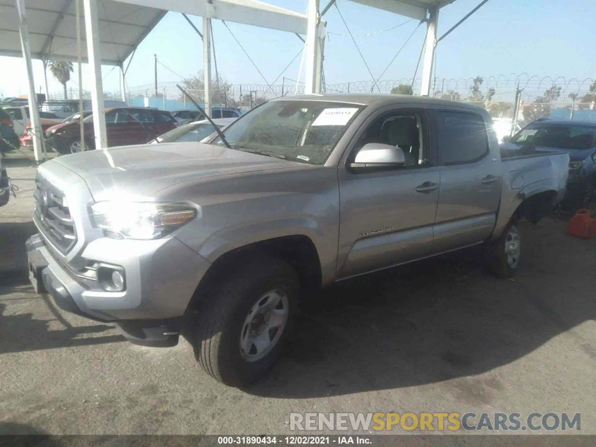 2 Photograph of a damaged car 5TFAX5GN0KX132393 TOYOTA TACOMA 2WD 2019