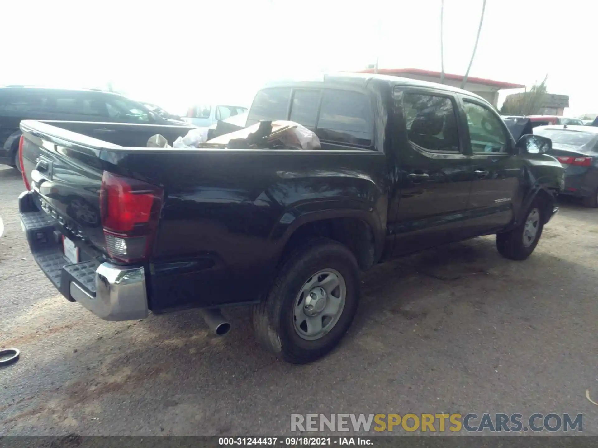 4 Photograph of a damaged car 5TFAX5GN0KX137898 TOYOTA TACOMA 2WD 2019