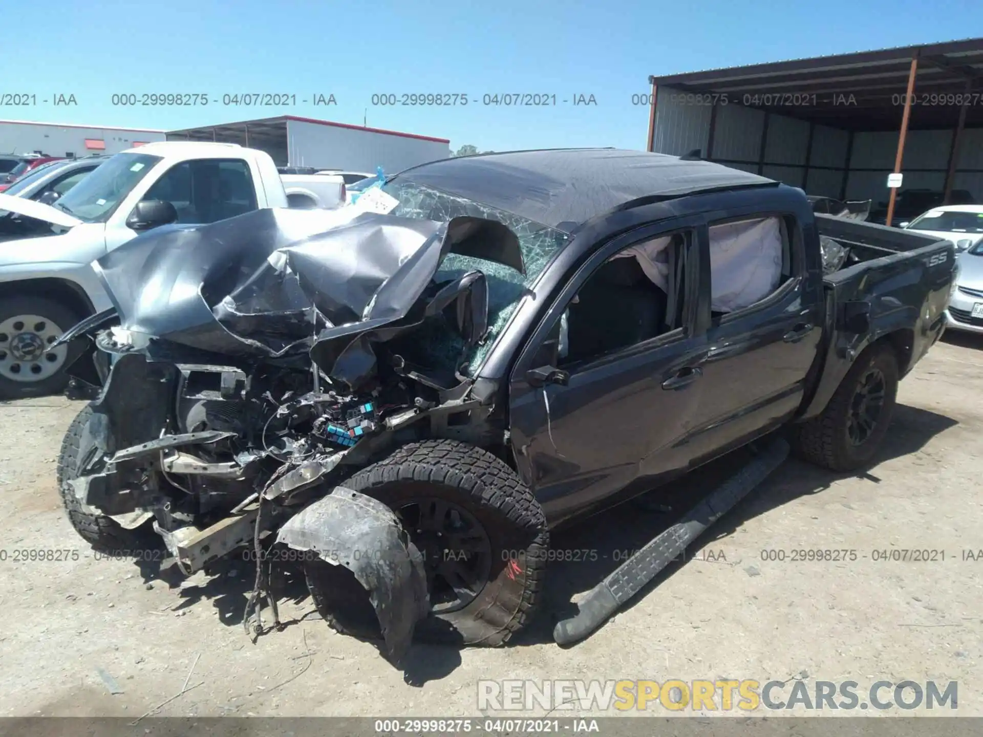 2 Photograph of a damaged car 5TFAX5GN0KX140879 TOYOTA TACOMA 2WD 2019