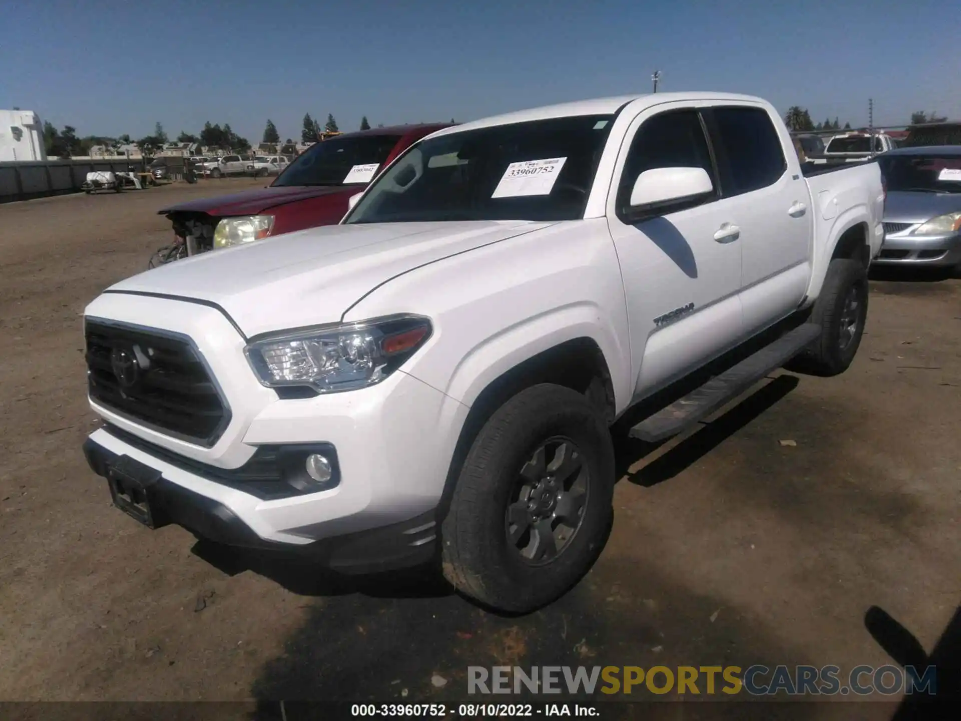 2 Photograph of a damaged car 5TFAX5GN0KX141708 TOYOTA TACOMA 2WD 2019