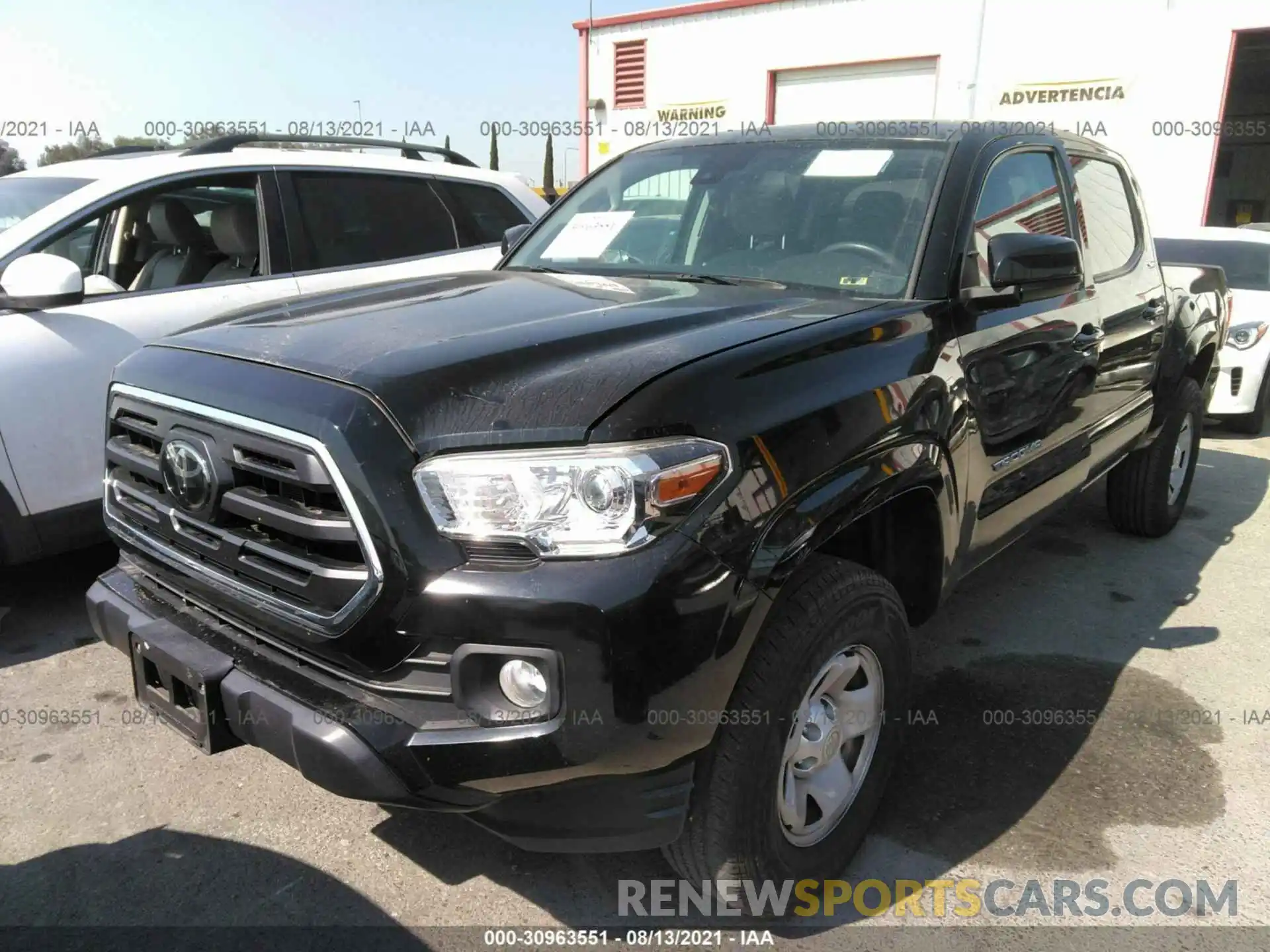 2 Photograph of a damaged car 5TFAX5GN0KX142633 TOYOTA TACOMA 2WD 2019