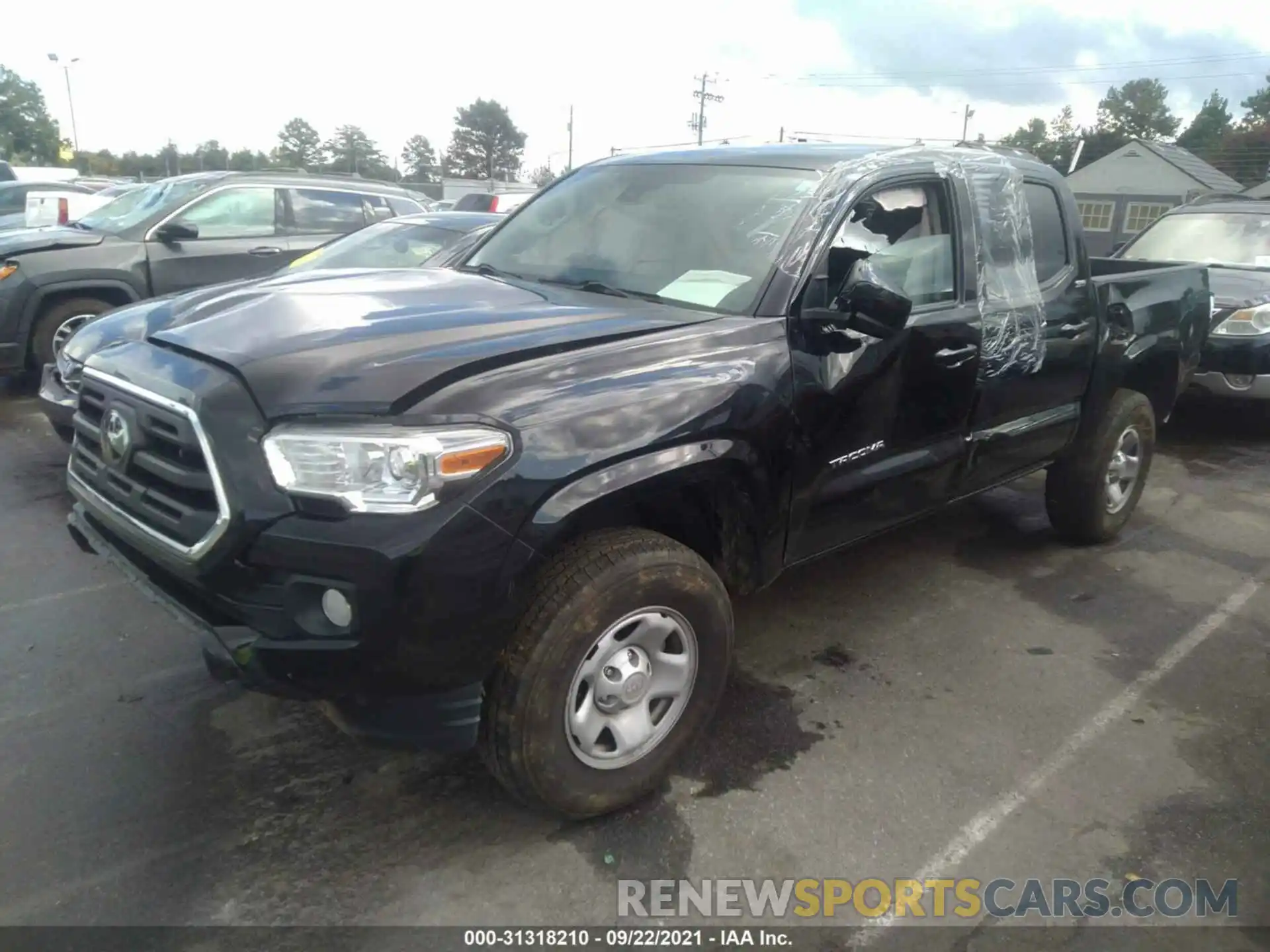 2 Photograph of a damaged car 5TFAX5GN0KX151610 TOYOTA TACOMA 2WD 2019