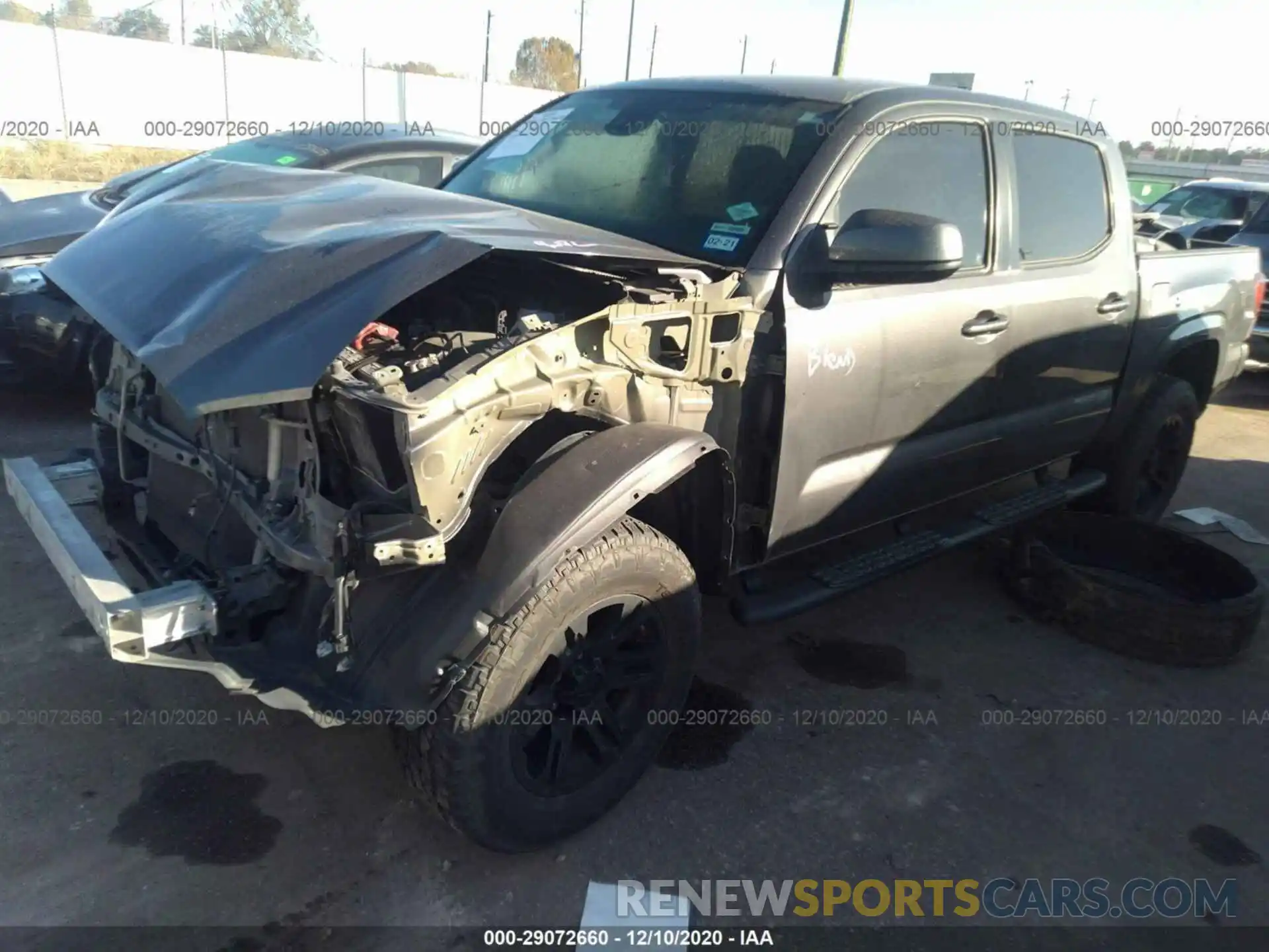 2 Photograph of a damaged car 5TFAX5GN1KX139272 TOYOTA TACOMA 2WD 2019