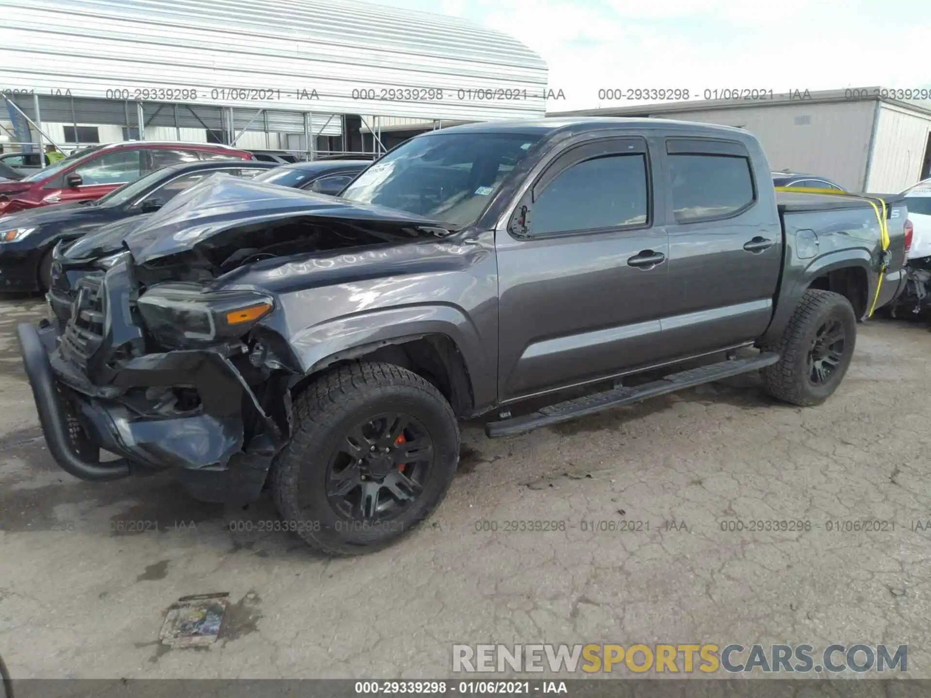 2 Photograph of a damaged car 5TFAX5GN1KX141202 TOYOTA TACOMA 2WD 2019