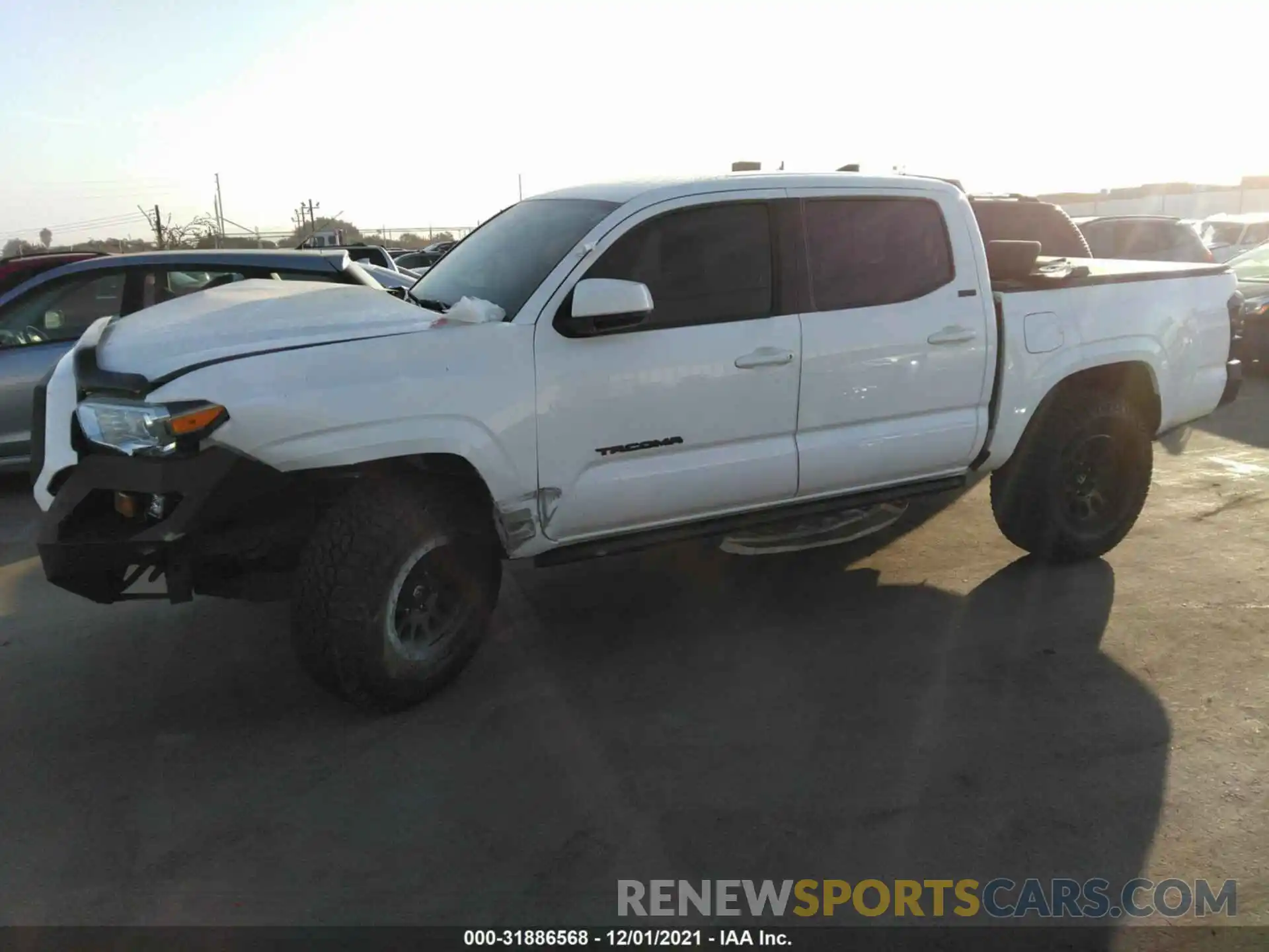 2 Photograph of a damaged car 5TFAX5GN1KX149557 TOYOTA TACOMA 2WD 2019