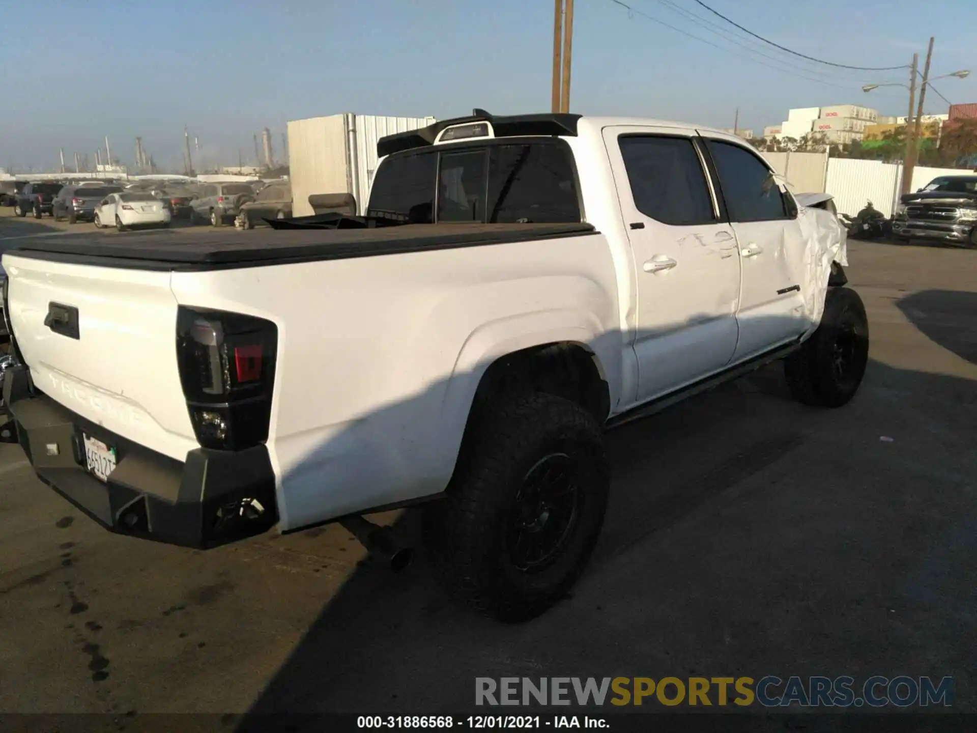 4 Фотография поврежденного автомобиля 5TFAX5GN1KX149557 TOYOTA TACOMA 2WD 2019