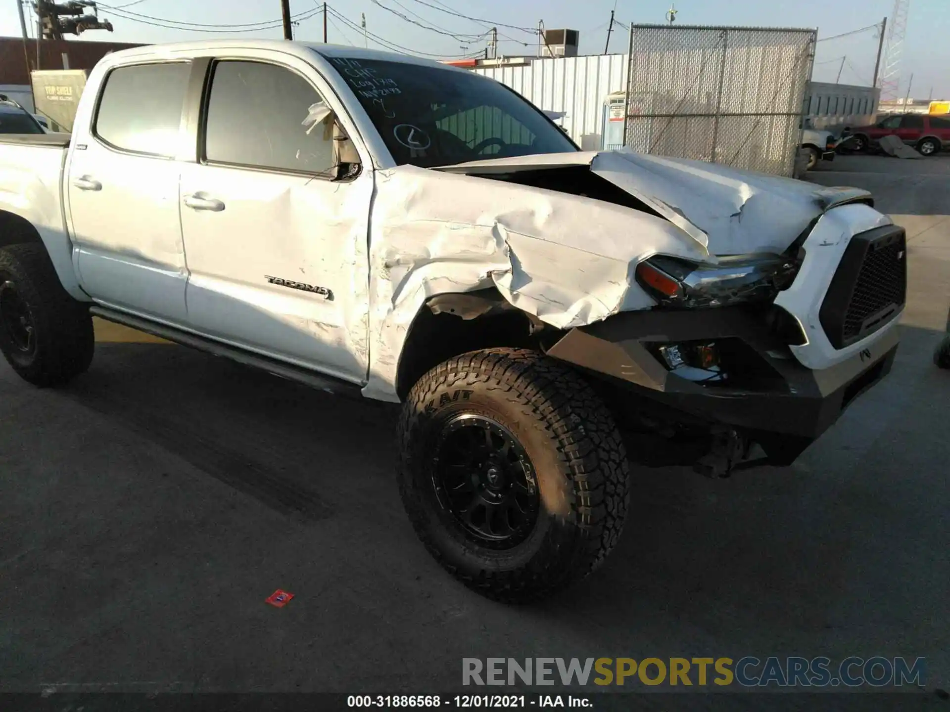 6 Photograph of a damaged car 5TFAX5GN1KX149557 TOYOTA TACOMA 2WD 2019