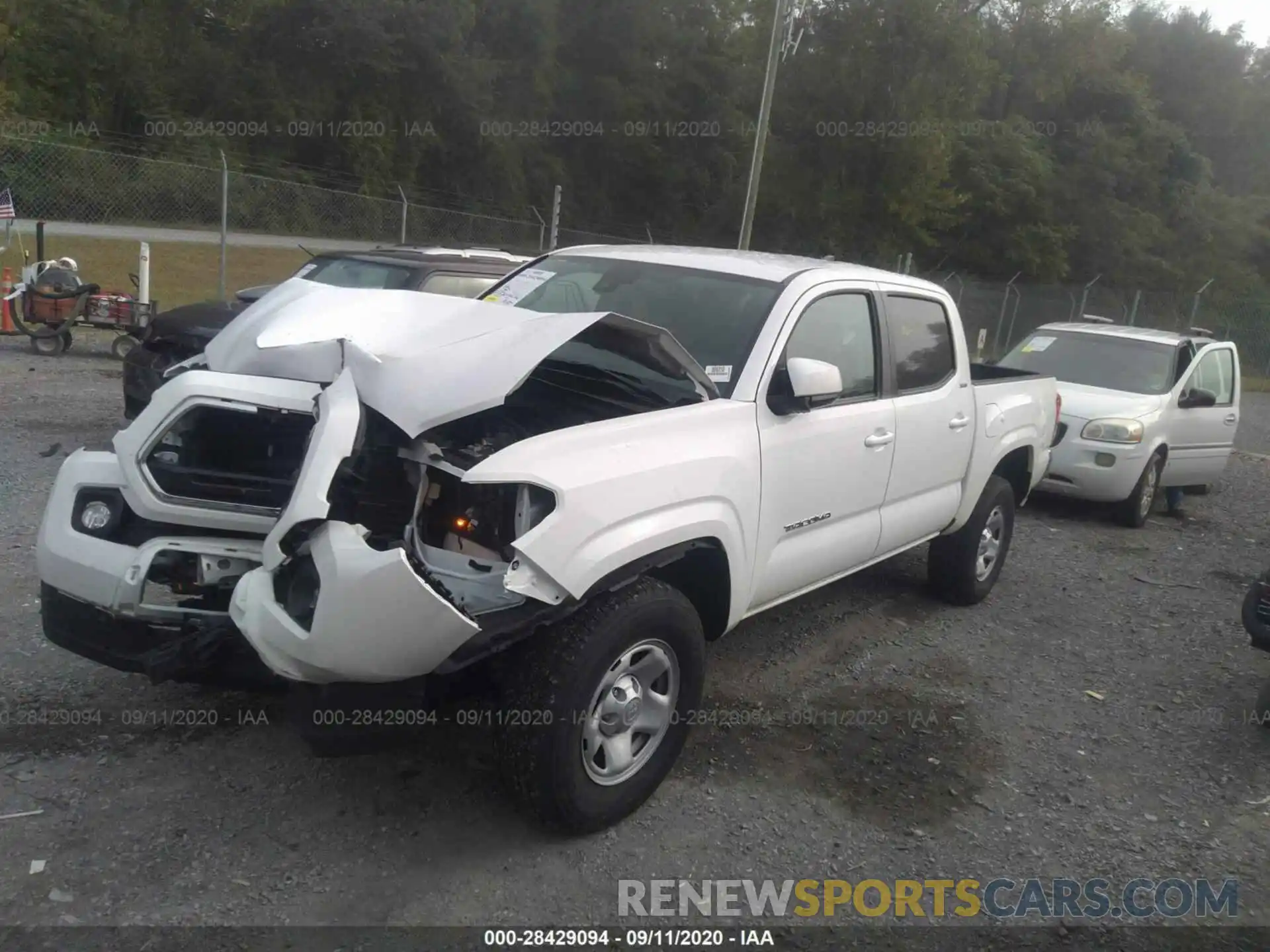 2 Photograph of a damaged car 5TFAX5GN1KX157593 TOYOTA TACOMA 2WD 2019