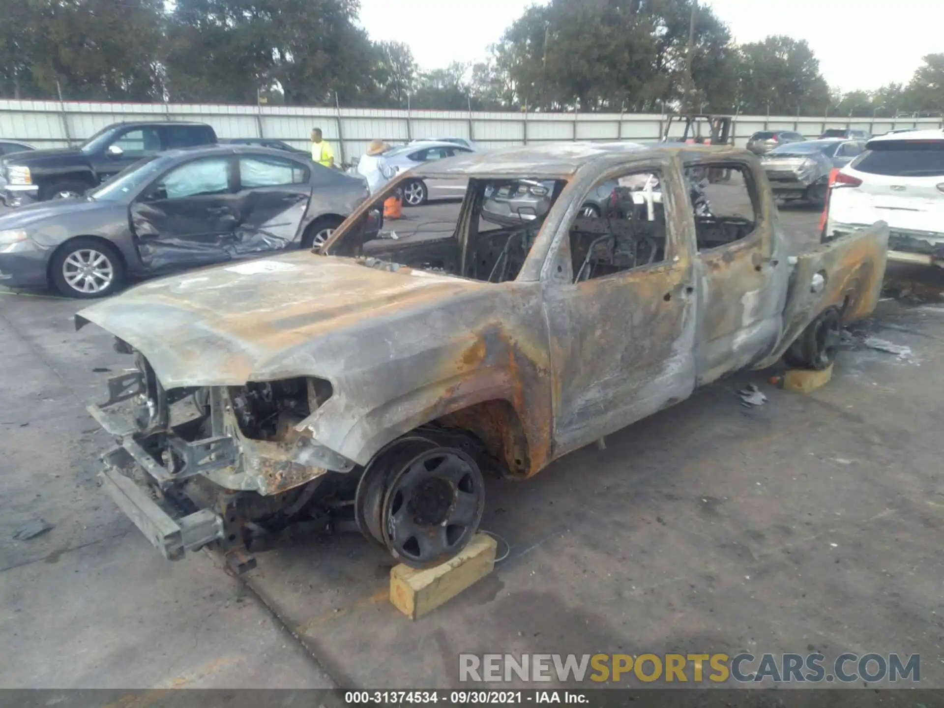 2 Photograph of a damaged car 5TFAX5GN2KX134727 TOYOTA TACOMA 2WD 2019