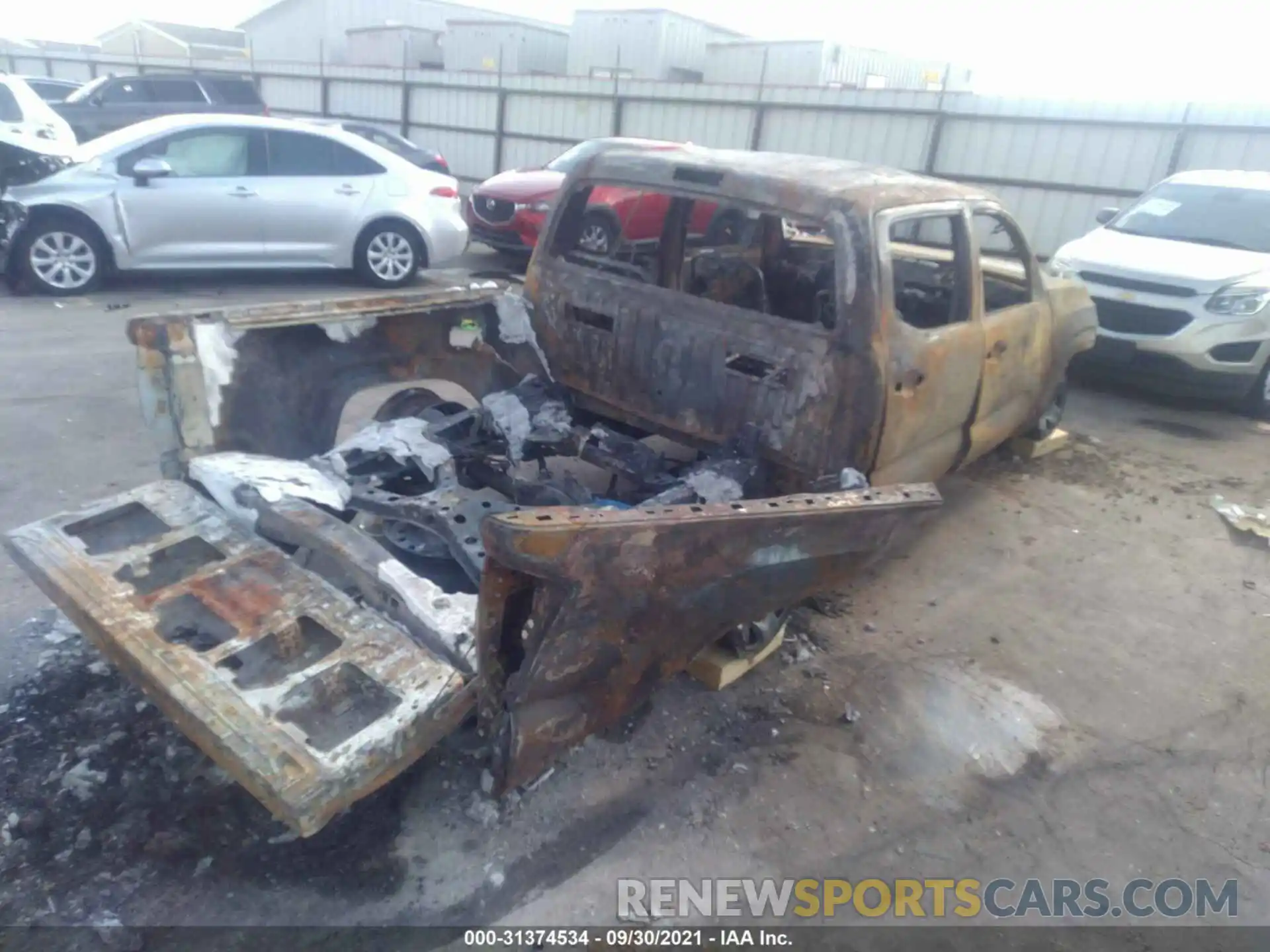 4 Photograph of a damaged car 5TFAX5GN2KX134727 TOYOTA TACOMA 2WD 2019