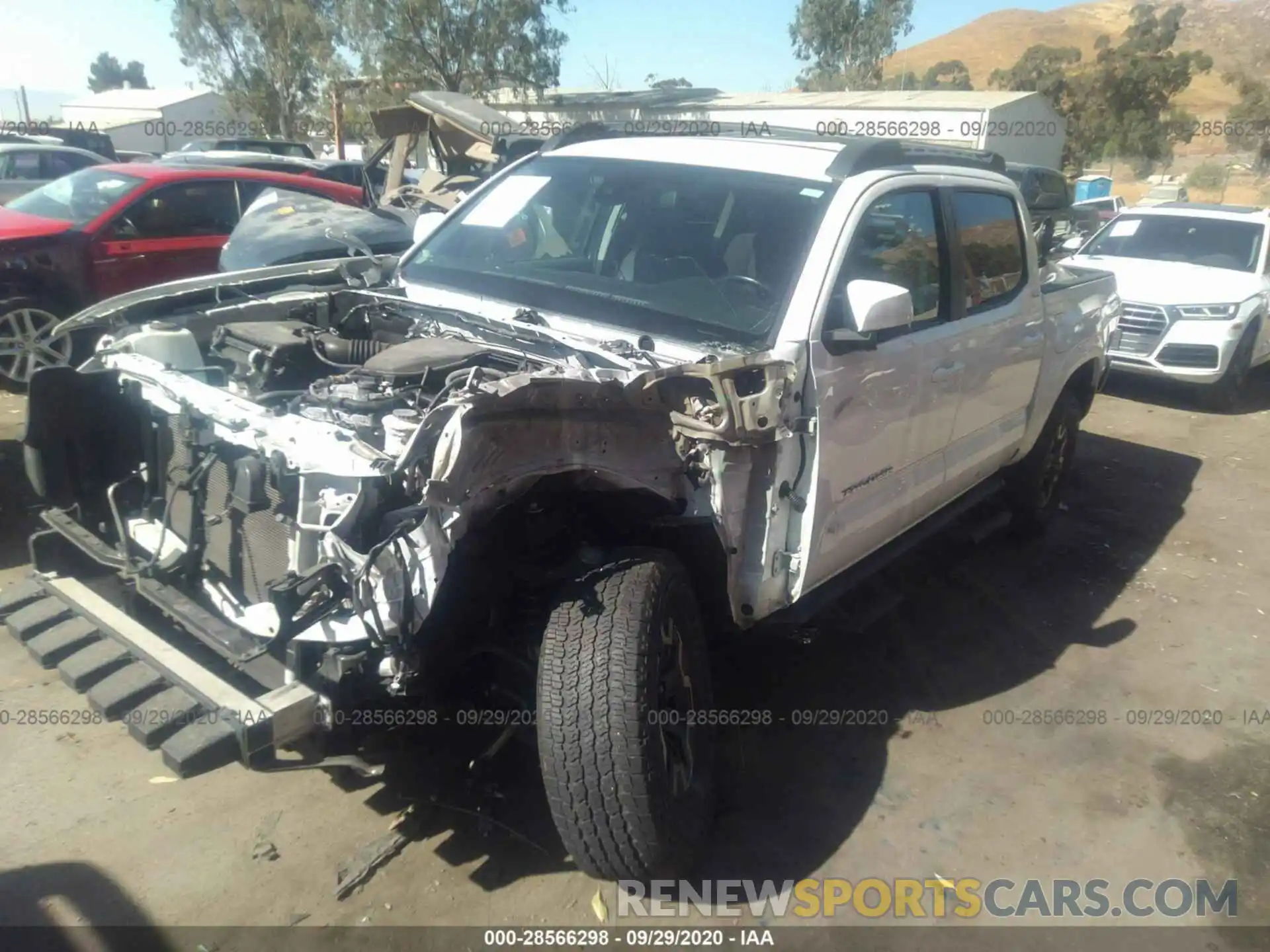 2 Photograph of a damaged car 5TFAX5GN2KX136185 TOYOTA TACOMA 2WD 2019